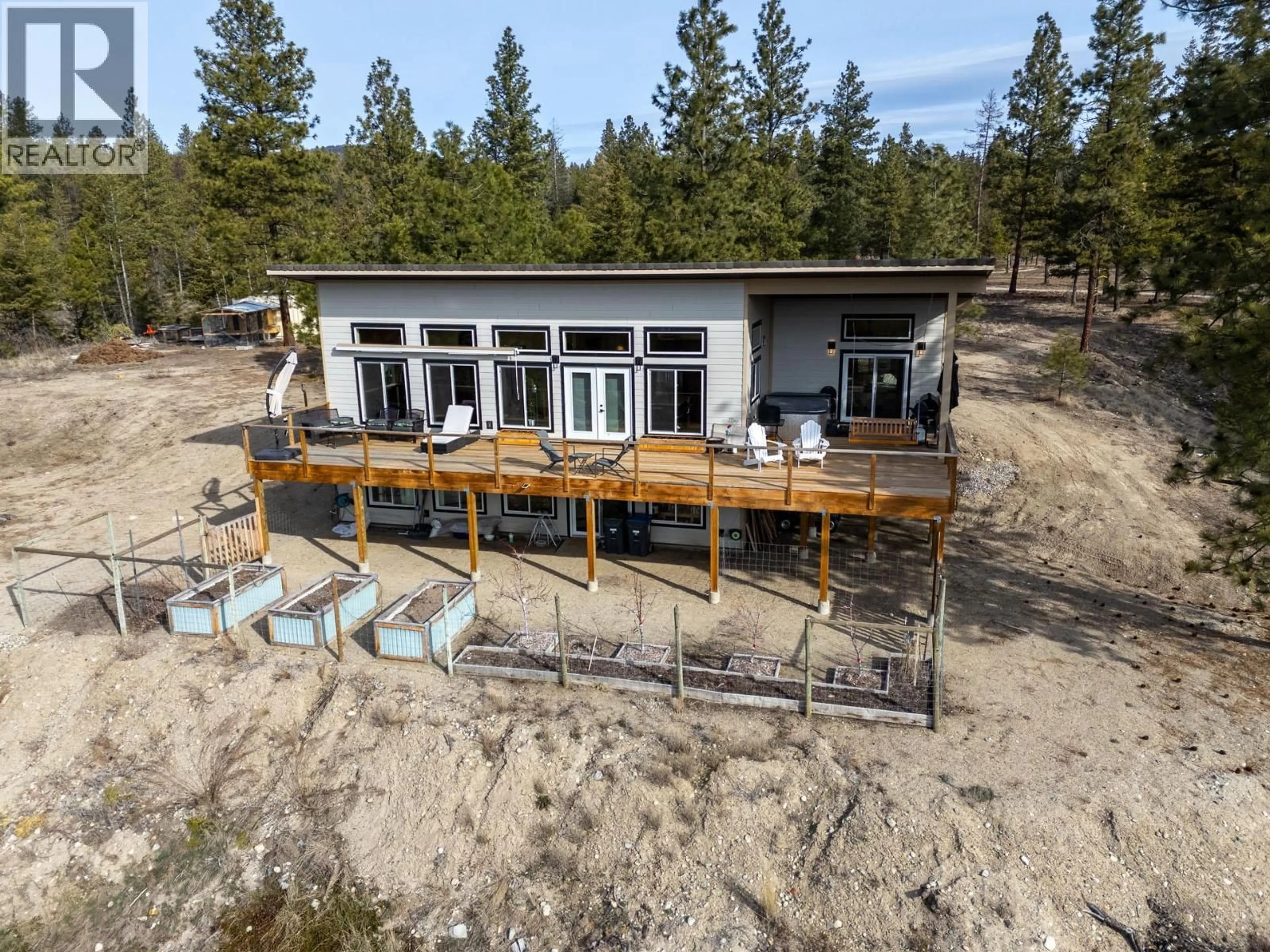 A pic from outside/outdoor area/front of a property/back of a property/a pic from drone, water/lake/river/ocean view for 31 NINE MILE PLACE, Osoyoos British Columbia V0H1V8