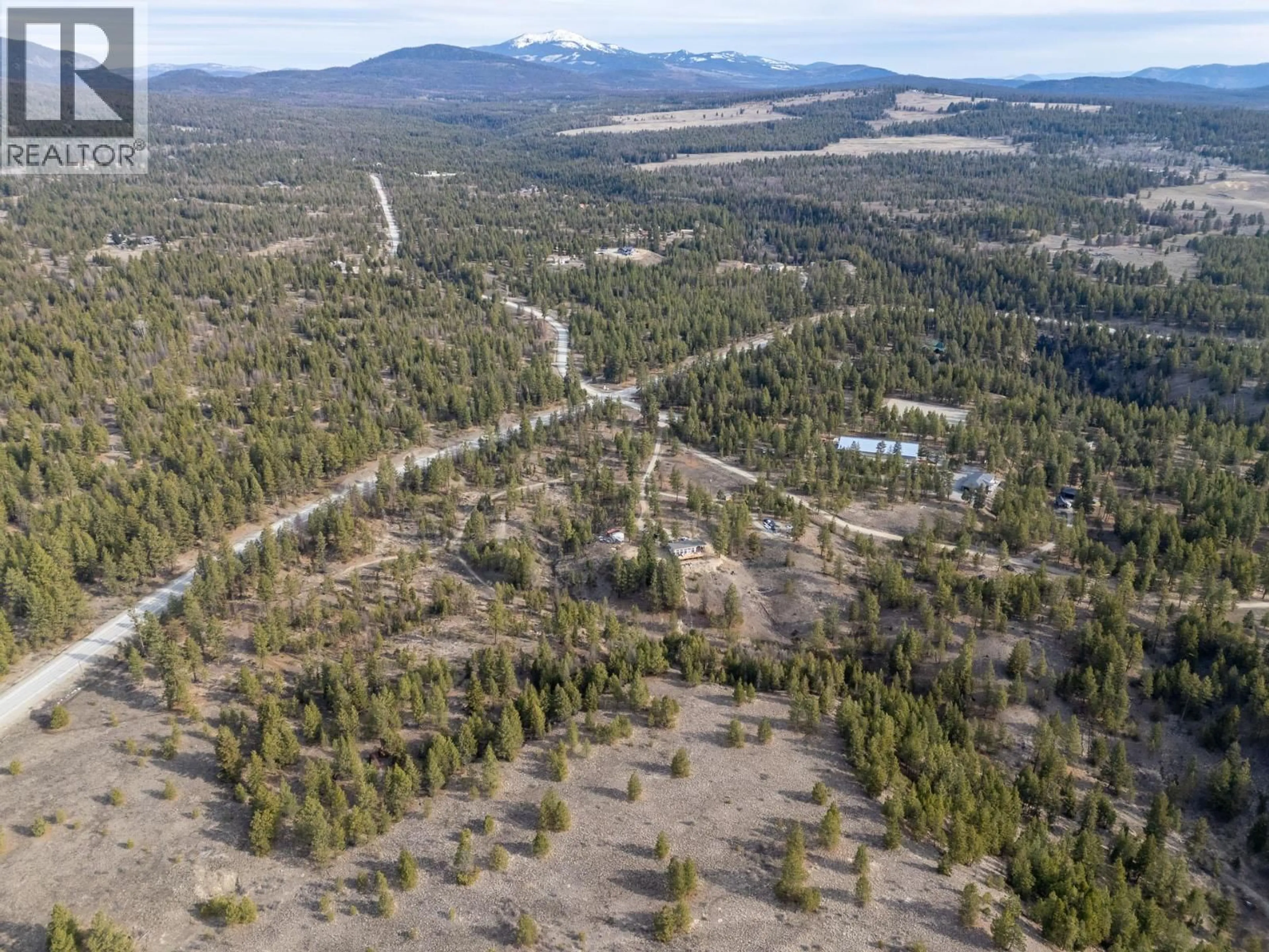 A pic from outside/outdoor area/front of a property/back of a property/a pic from drone, forest/trees view for 31 NINE MILE PLACE, Osoyoos British Columbia V0H1V8