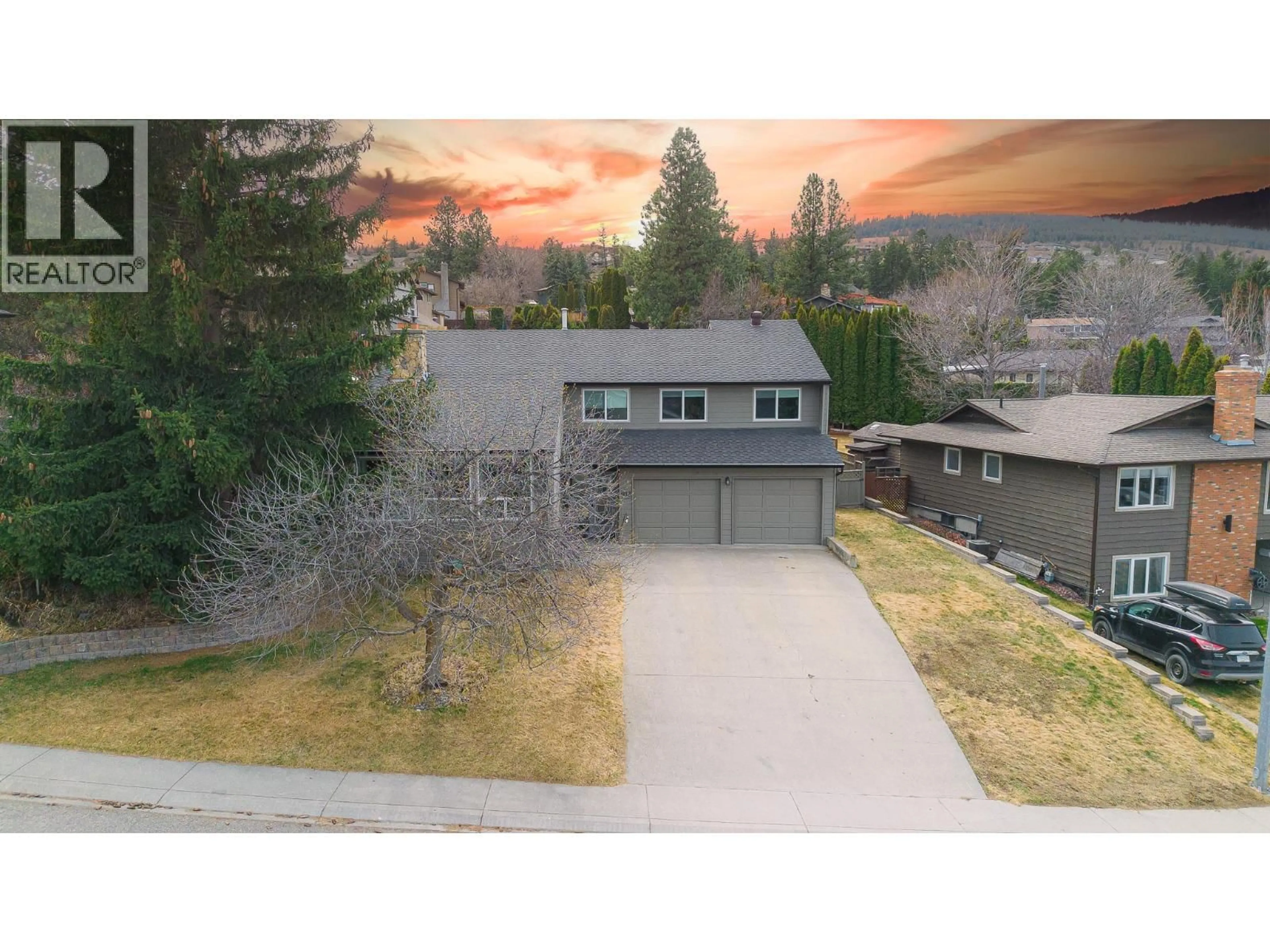 A pic from outside/outdoor area/front of a property/back of a property/a pic from drone, mountain view for 913 HUNTLEIGH CRESCENT, Kamloops British Columbia V1S1G7