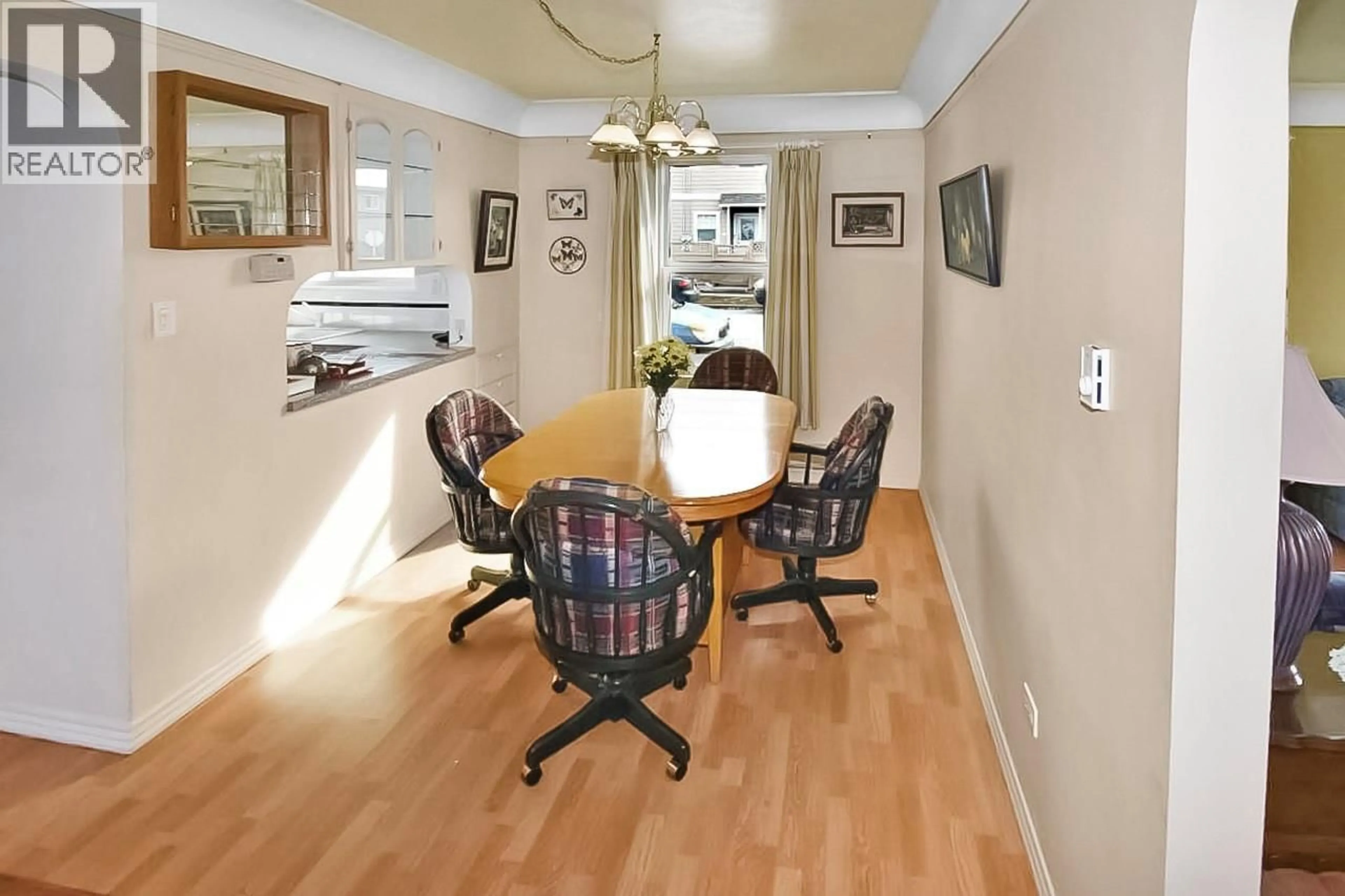Dining room, wood/laminate floor for 498 BRAID STREET, Penticton British Columbia V2A4Y2