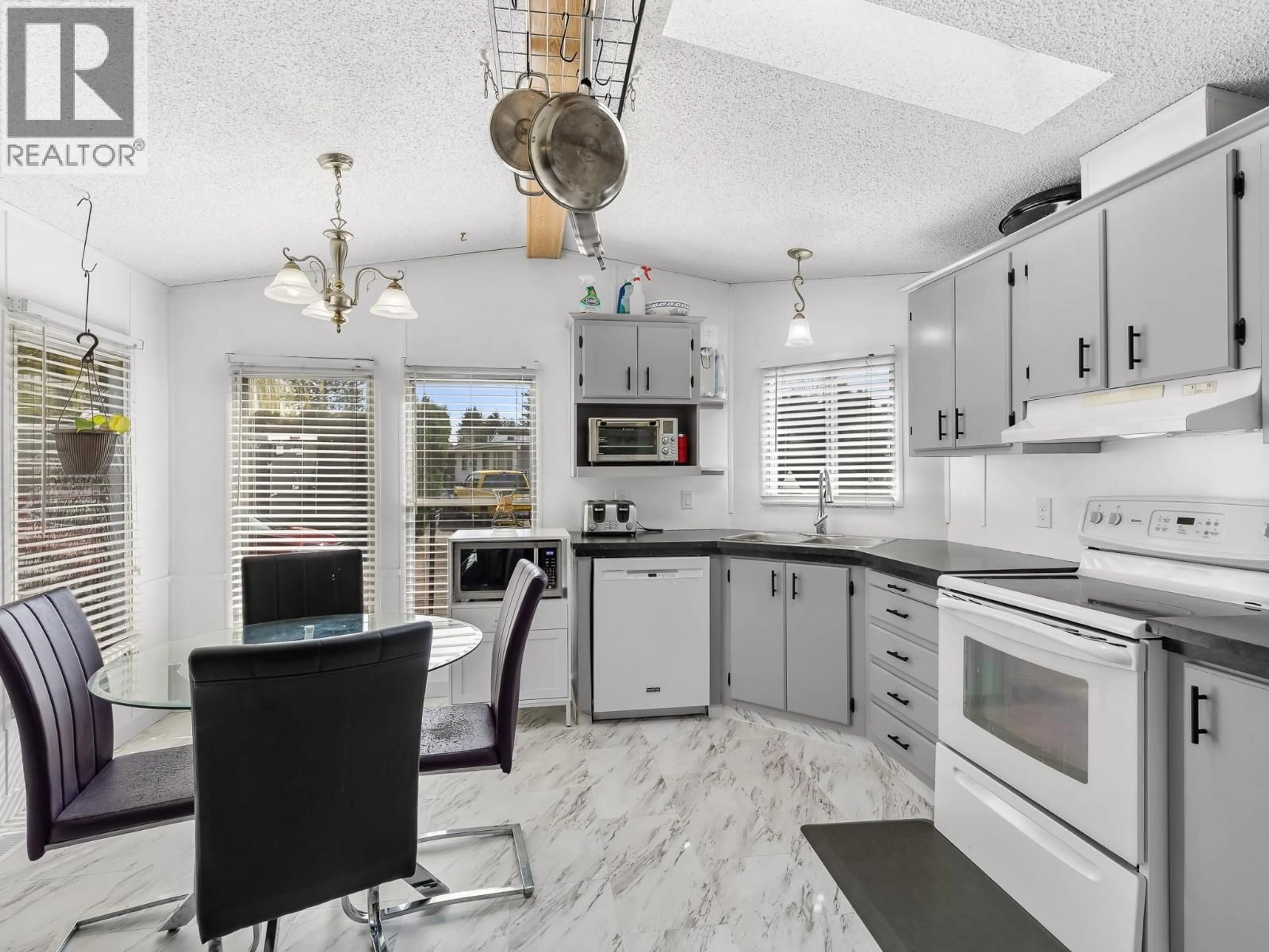 Open concept kitchen, ceramic/tile floor for 94 - 715 BEAVER LAKE ROAD, Kelowna British Columbia V4V1E6