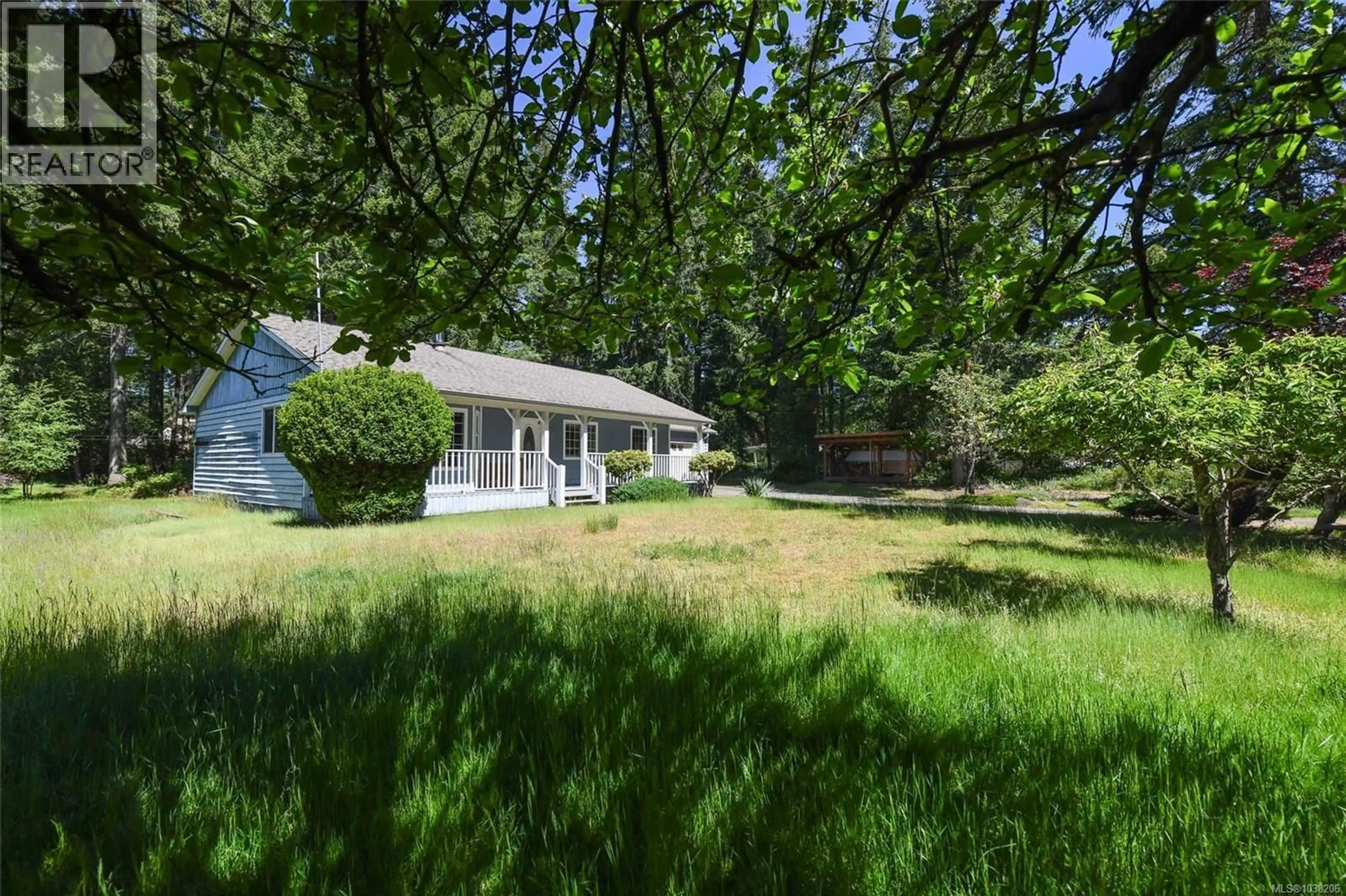 A pic from outside/outdoor area/front of a property/back of a property/a pic from drone, forest/trees view for 2410 HUBAND ROAD, Courtenay British Columbia V9J1L6
