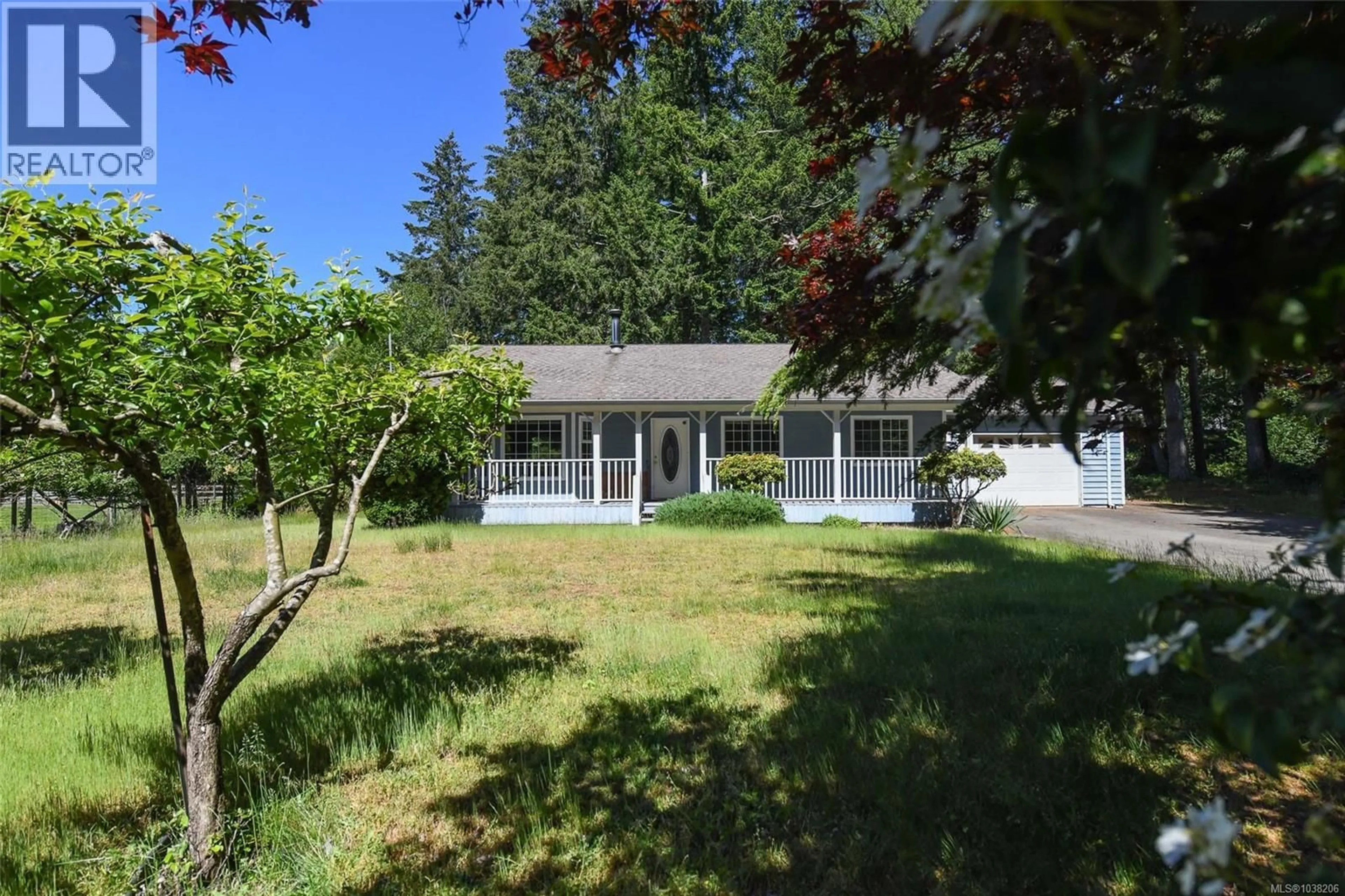 A pic from outside/outdoor area/front of a property/back of a property/a pic from drone, street for 2410 HUBAND ROAD, Courtenay British Columbia V9J1L6