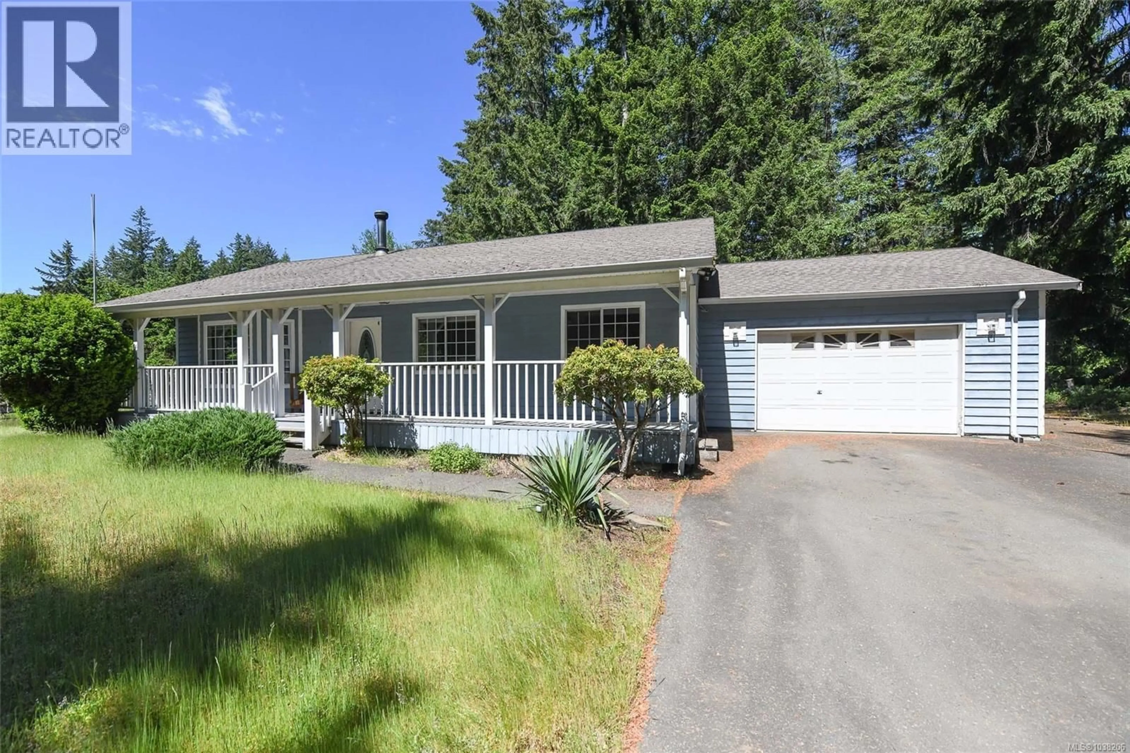 Home with vinyl exterior material, street for 2410 HUBAND ROAD, Courtenay British Columbia V9J1L6