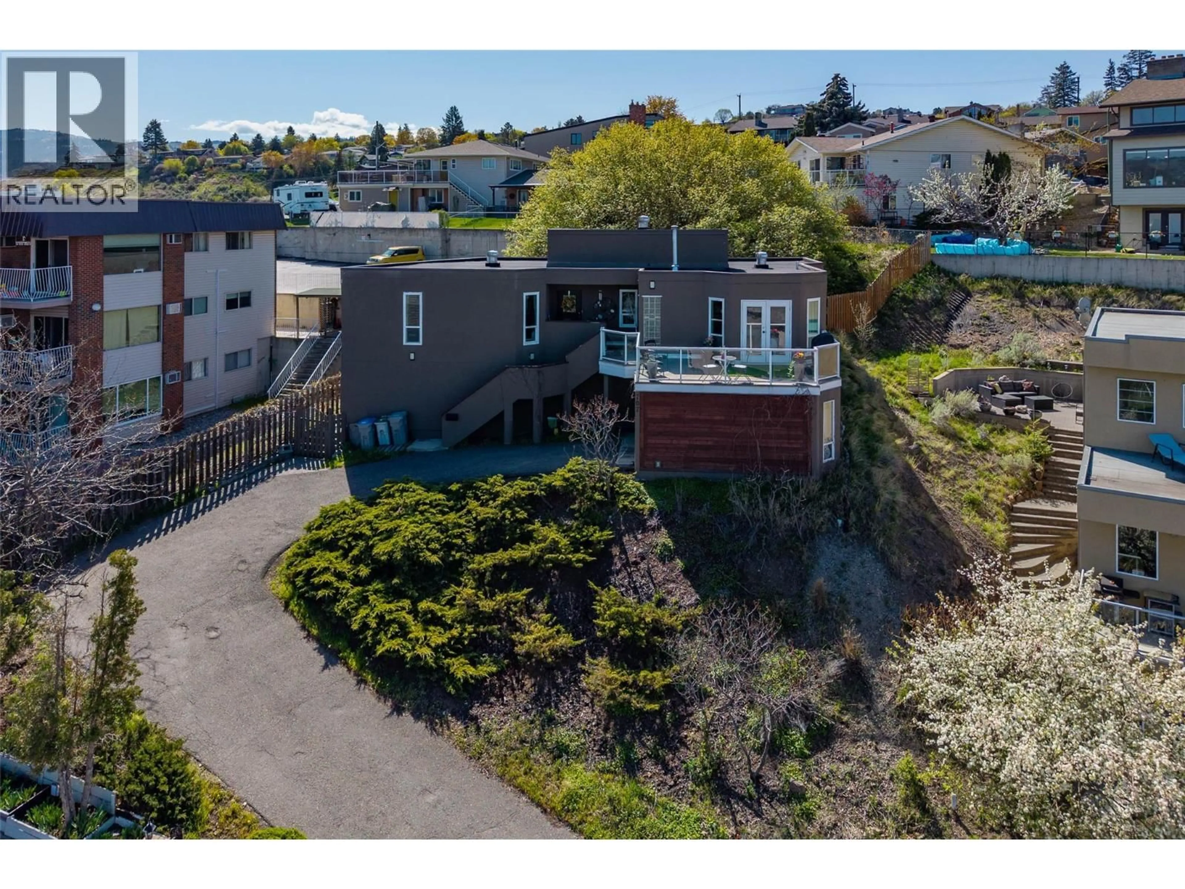 A pic from outside/outdoor area/front of a property/back of a property/a pic from drone, street for 707 CHAPARRAL PLACE, Kamloops British Columbia V2C5Y3