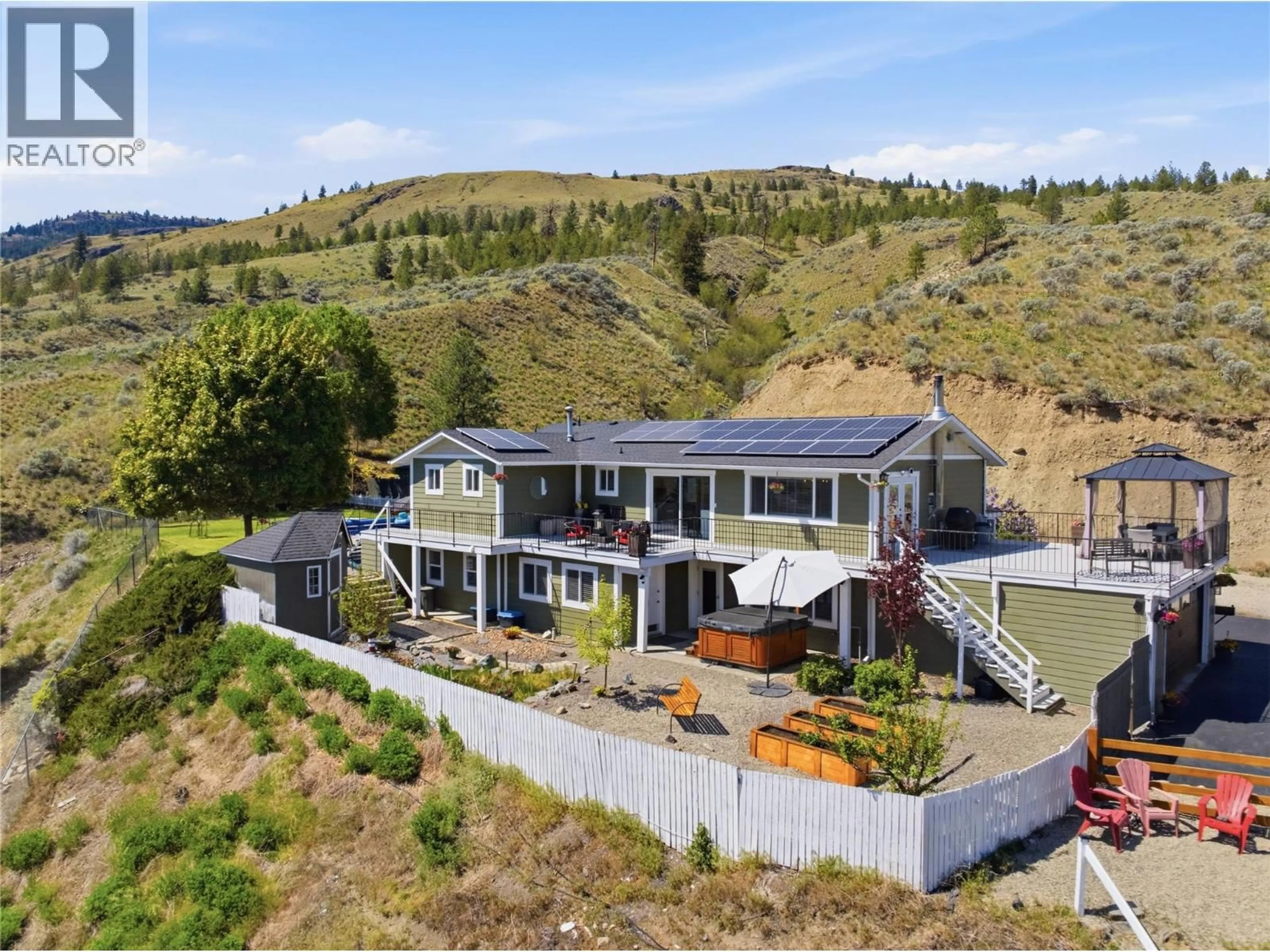 A pic from outside/outdoor area/front of a property/back of a property/a pic from drone, mountain view for 899 IDA LANE, Kamloops British Columbia V2B6V2