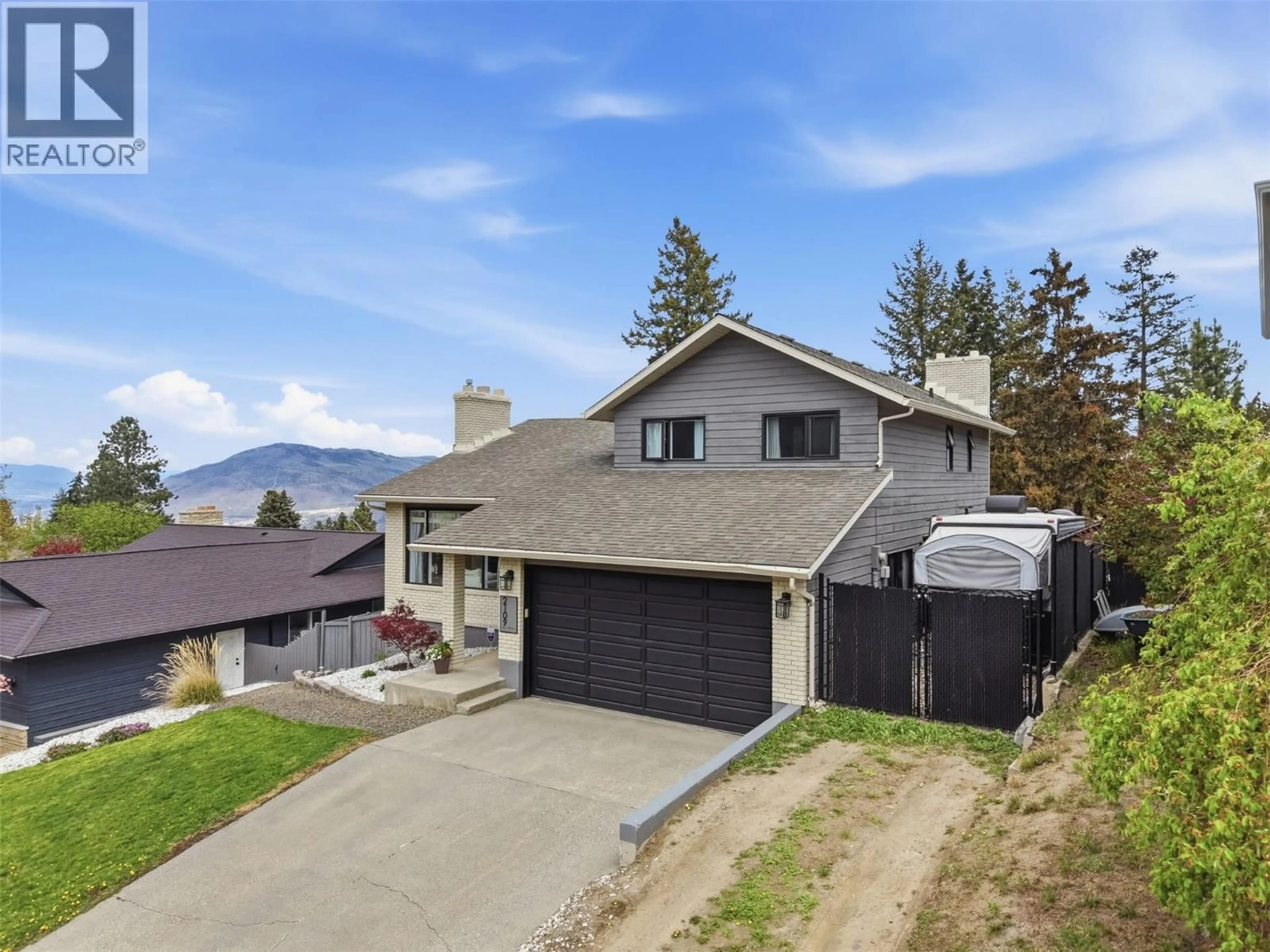 A pic from outside/outdoor area/front of a property/back of a property/a pic from drone, mountain view for 2109 VAN HORNE DRIVE, Kamloops British Columbia V1S1G4