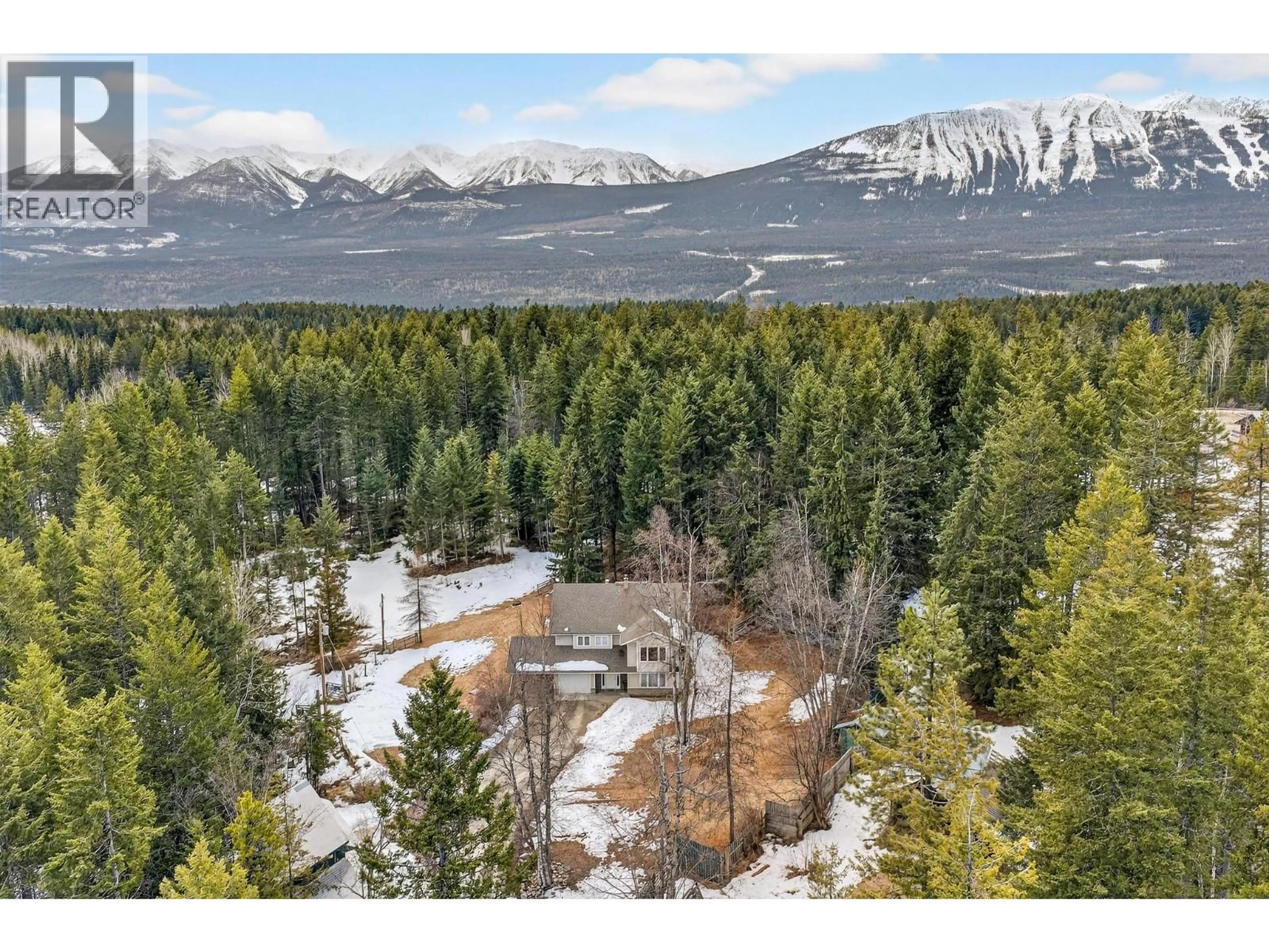 A pic from outside/outdoor area/front of a property/back of a property/a pic from drone, forest/trees view for 656 LAFONTAINE ROAD EAST, Golden British Columbia V0A1H3