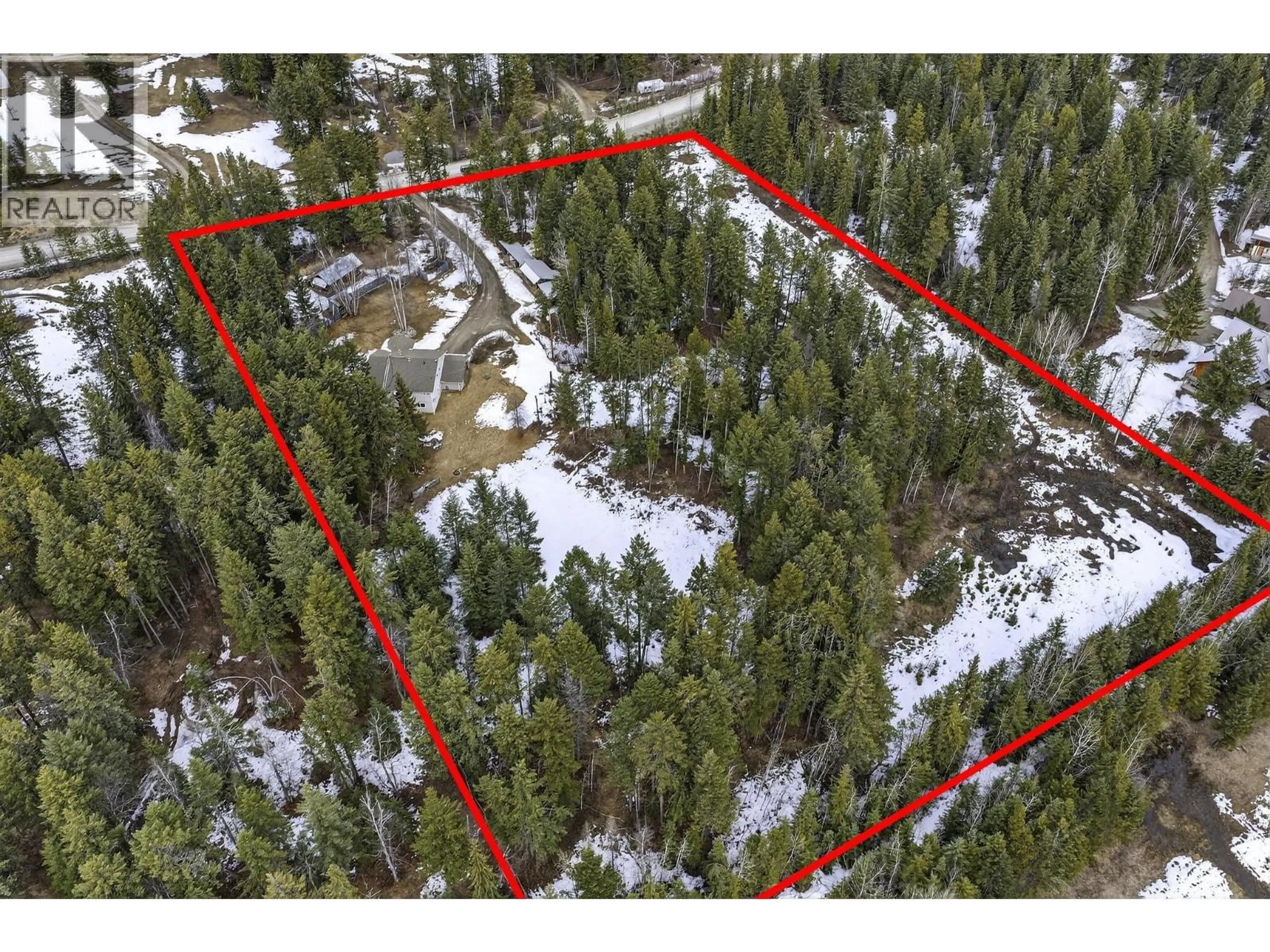 A pic from outside/outdoor area/front of a property/back of a property/a pic from drone, forest/trees view for 656 LAFONTAINE ROAD EAST, Golden British Columbia V0A1H3