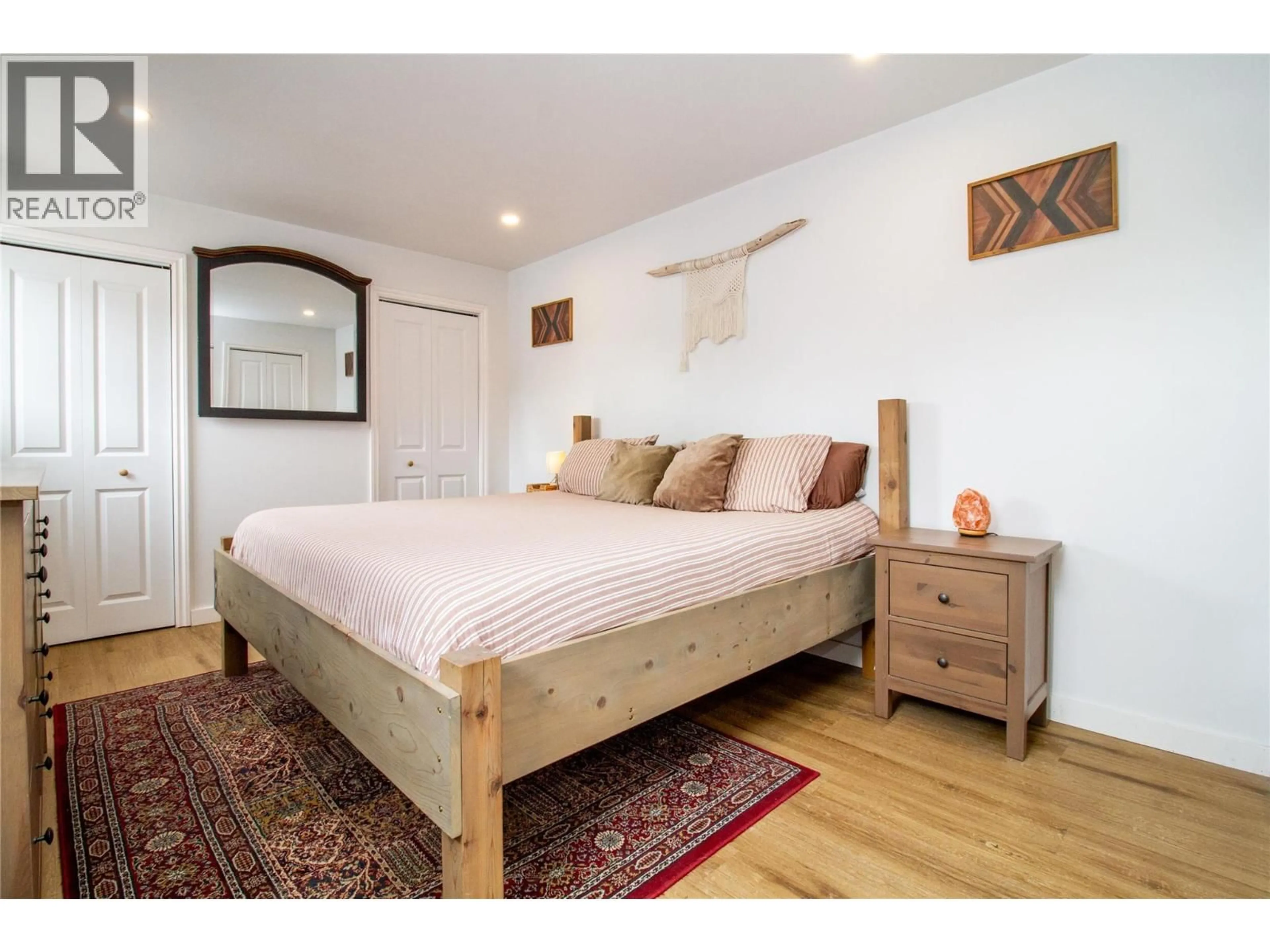 Bedroom with bed, wood/laminate floor for 509 EIGHTH STREET EAST, Revelstoke British Columbia V0E2S0