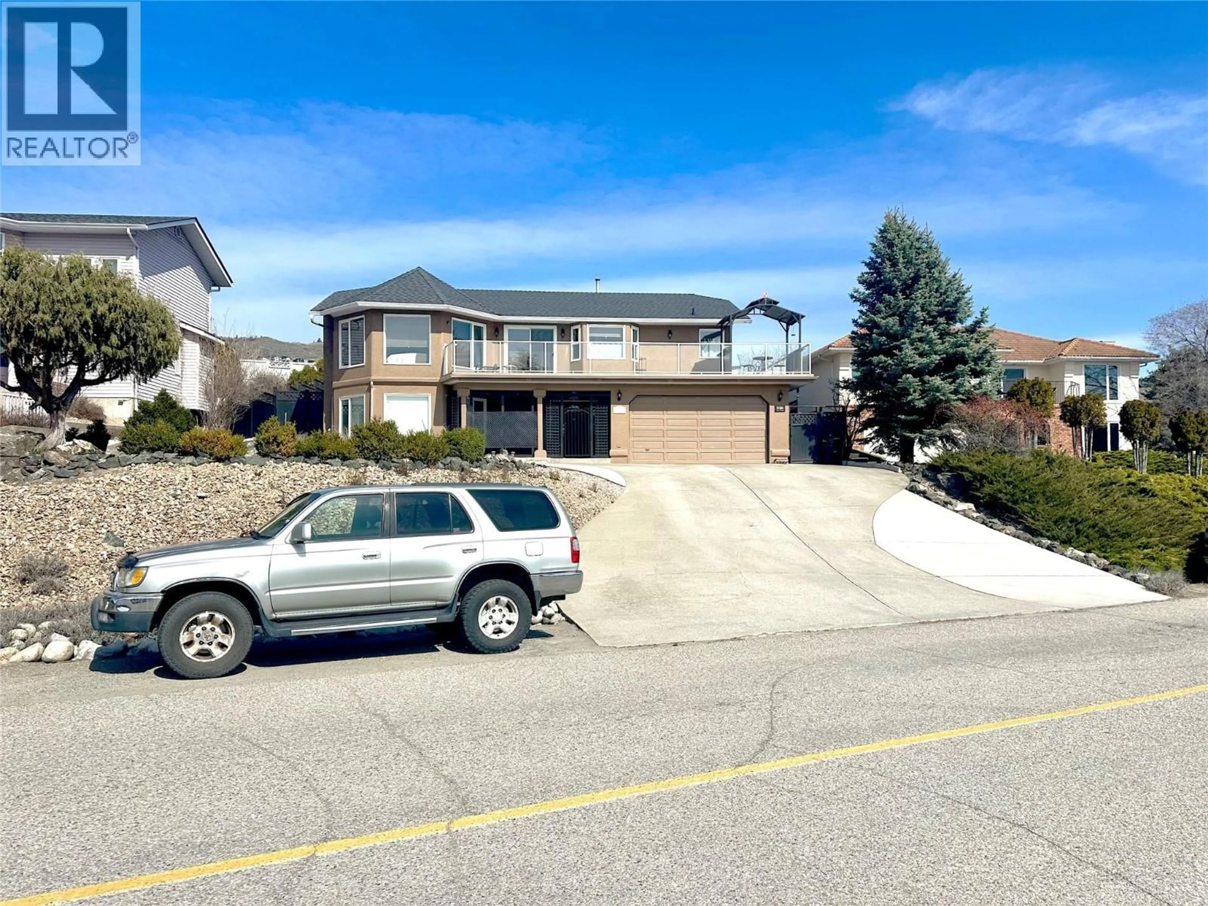 A pic from outside/outdoor area/front of a property/back of a property/a pic from drone, street for 6815 CAMEO DRIVE NORTH, Vernon British Columbia V1H1N9