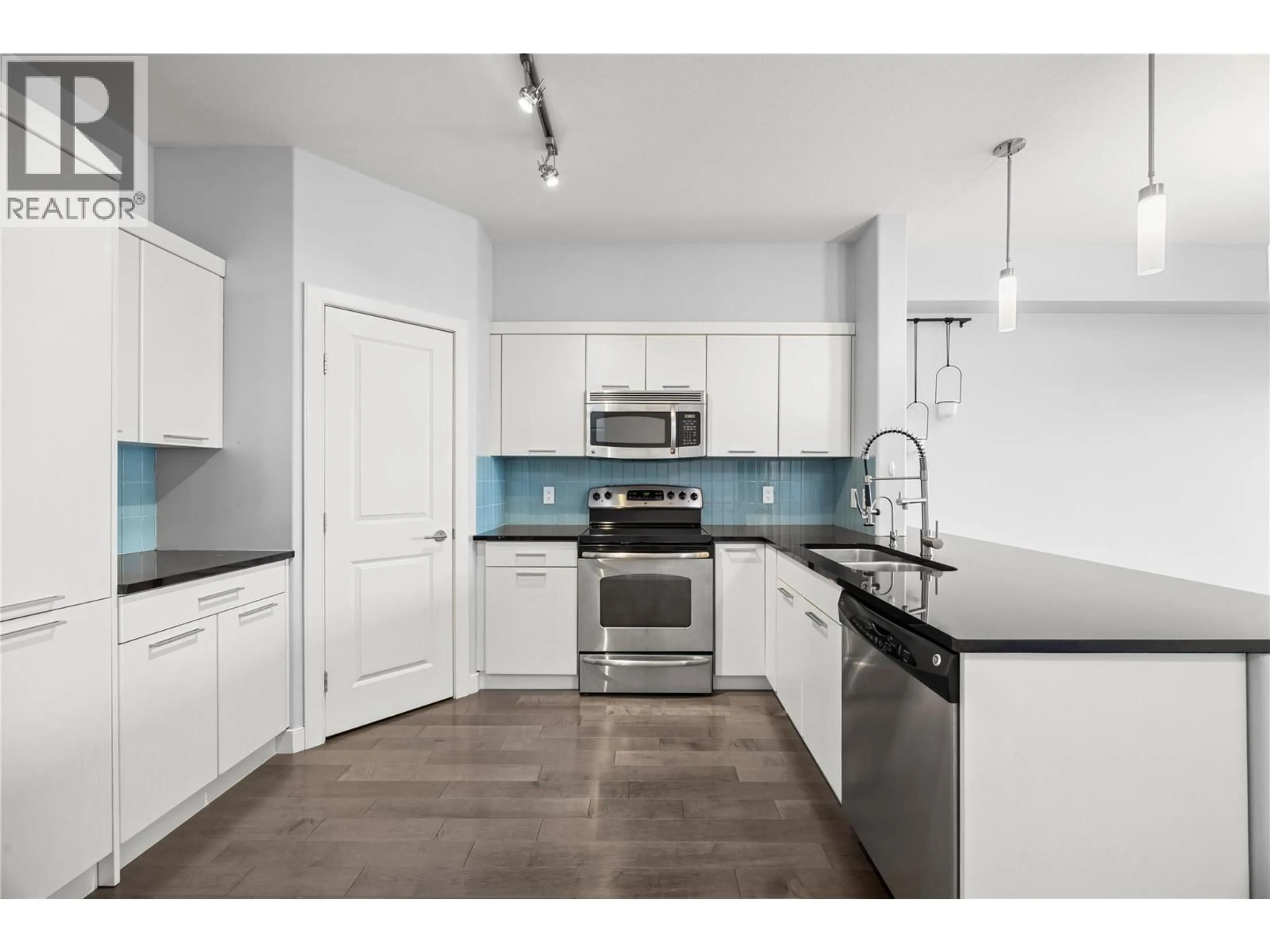 Open concept kitchen, ceramic/tile floor for 608 - 3645 CARRINGTON ROAD, West Kelowna British Columbia V4T3G9