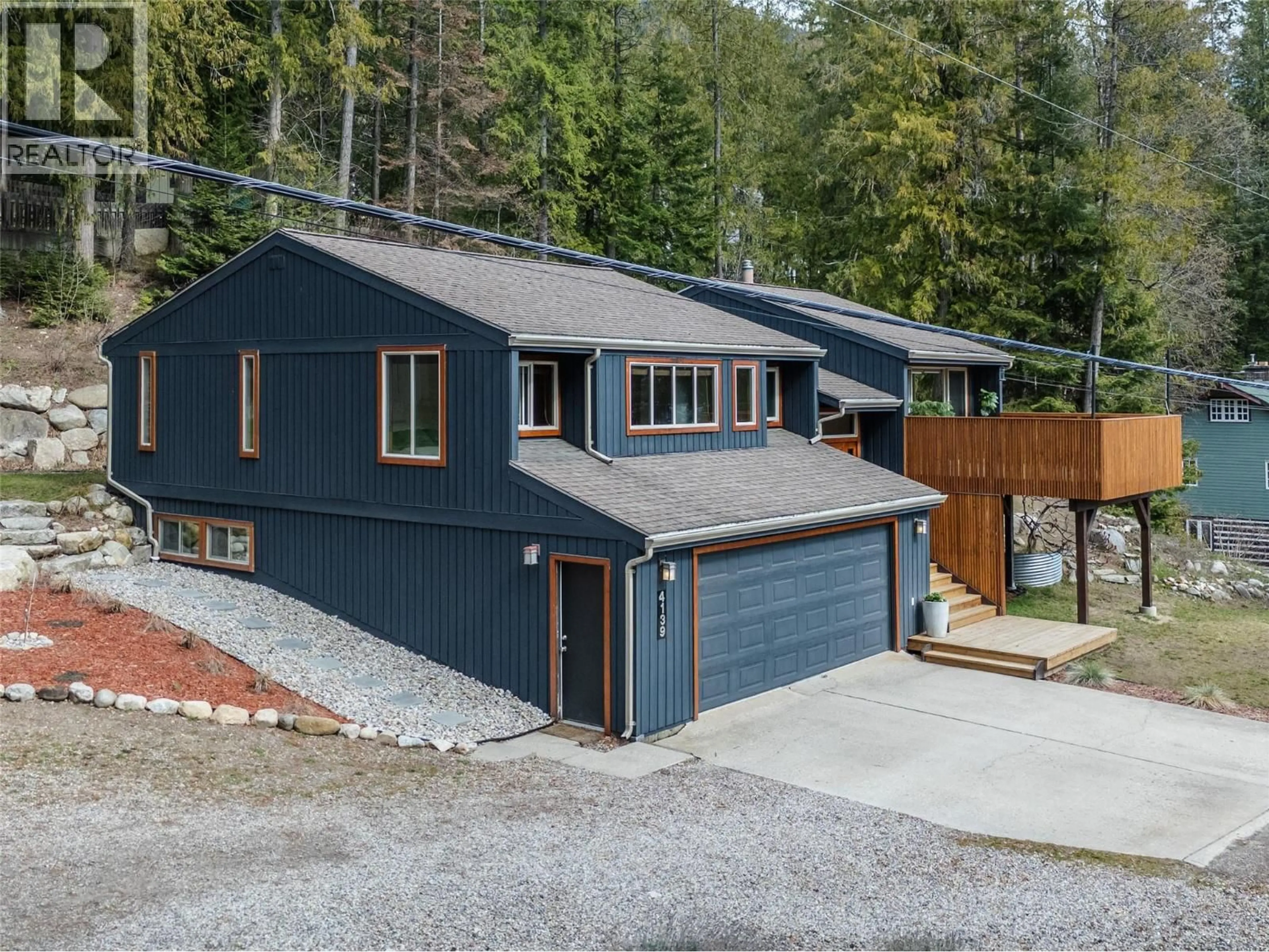 A pic from outside/outdoor area/front of a property/back of a property/a pic from drone, street for 4139 GRANGER ROAD, Nelson British Columbia V1L6T1