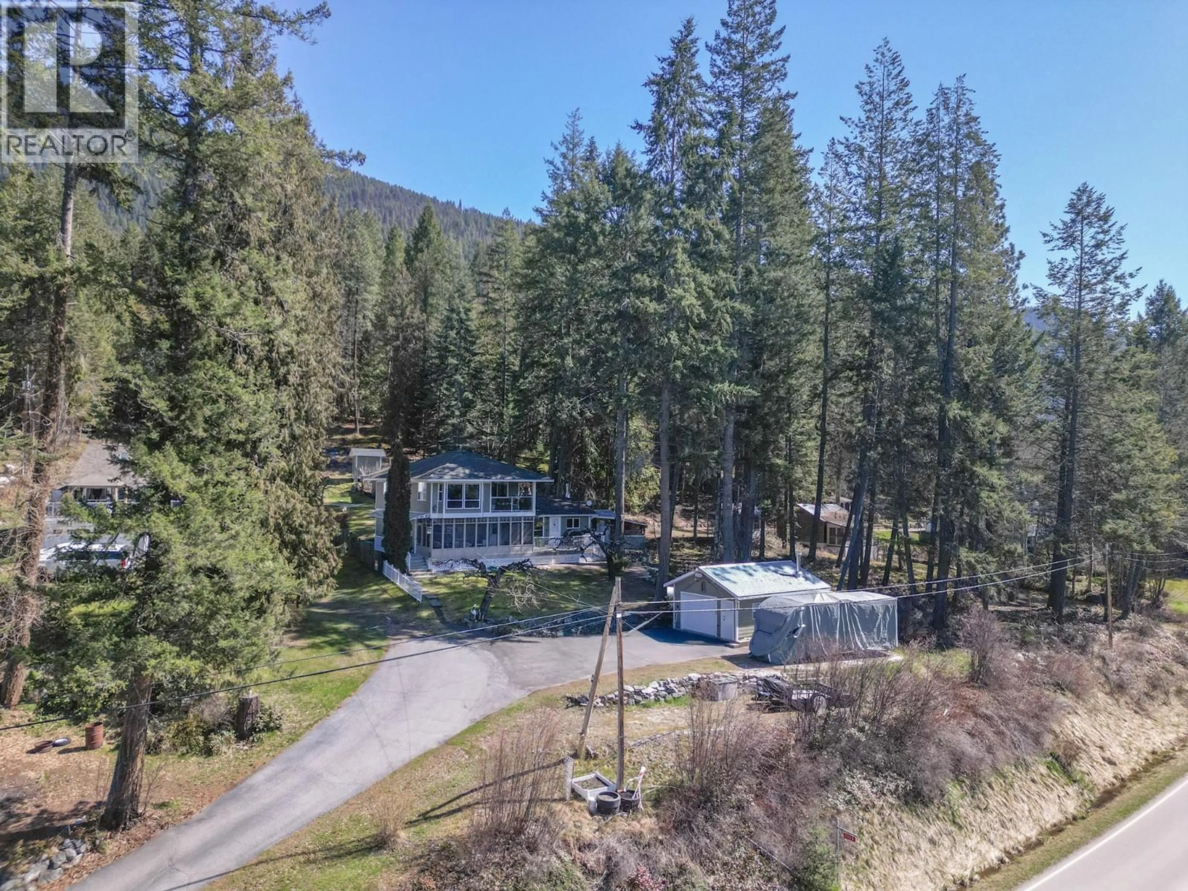 A pic from outside/outdoor area/front of a property/back of a property/a pic from drone, mountain view for 11110 3A HIGHWAY, Sanca British Columbia V0B1A2