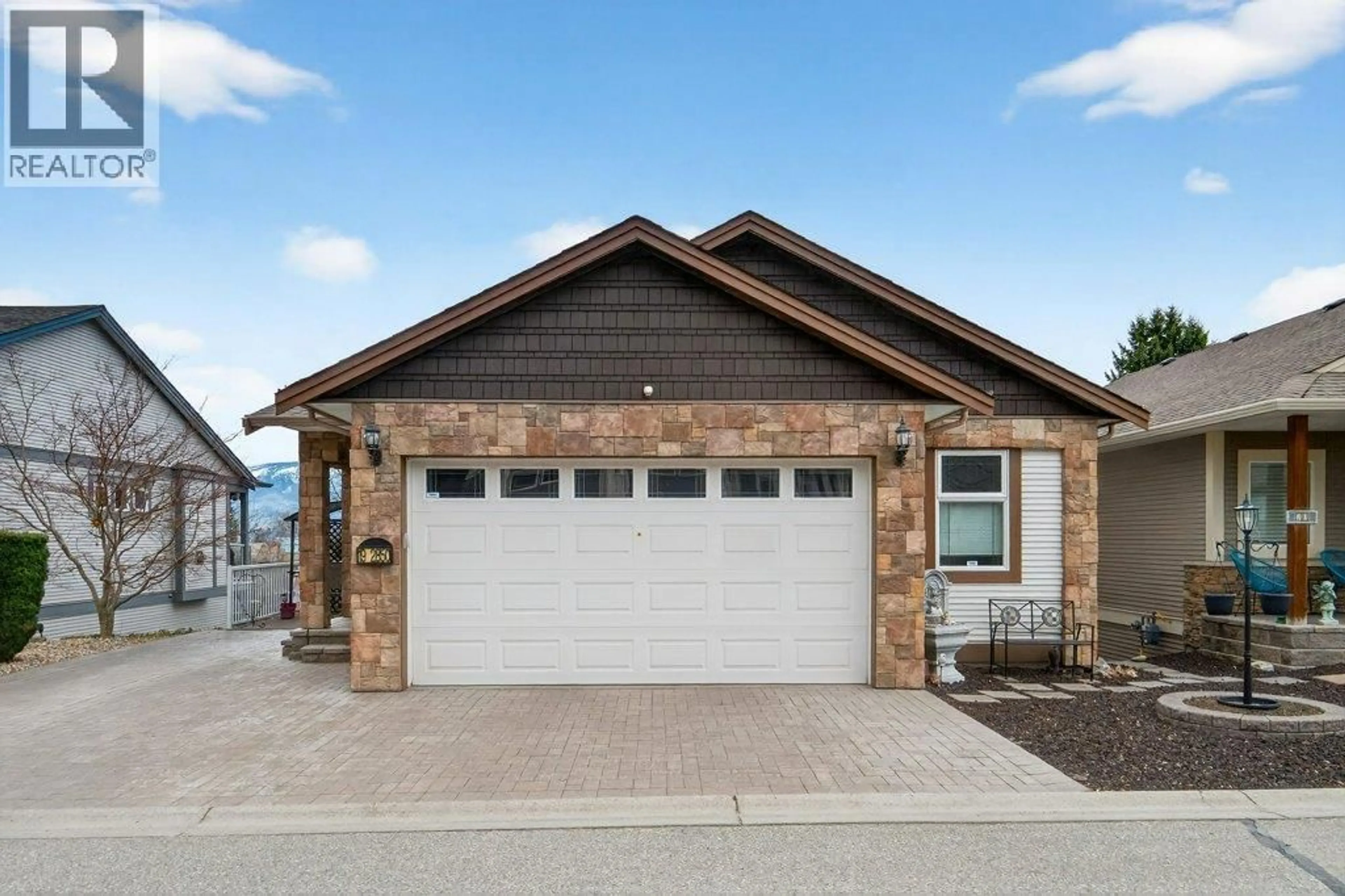 Home with brick exterior material, street for 19 - 2850 7 AVENUE NORTHEAST, Salmon Arm British Columbia V1E0B7