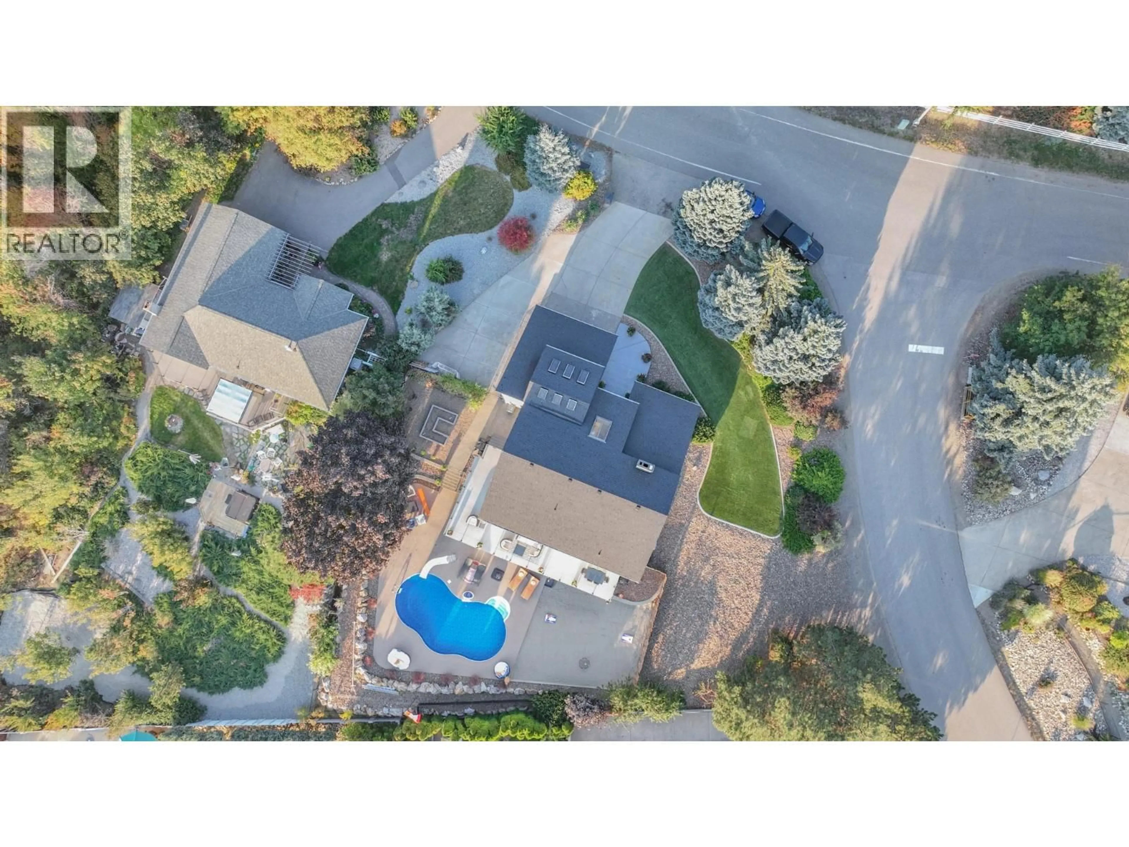 A pic from outside/outdoor area/front of a property/back of a property/a pic from drone, street for 702 CYPRESS DRIVE, Coldstream British Columbia V1B2X9