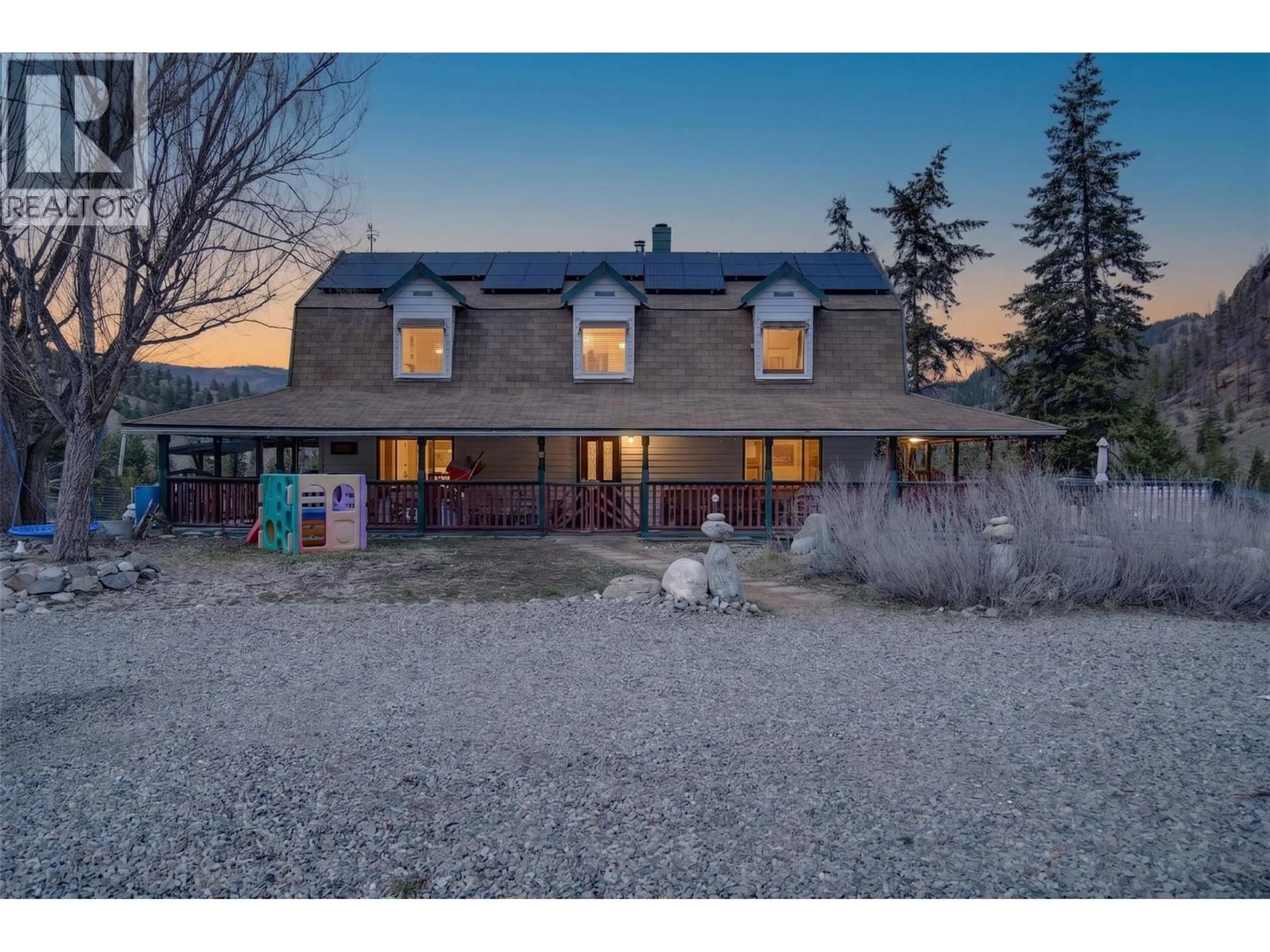A pic from outside/outdoor area/front of a property/back of a property/a pic from drone, street for 561 GRAND ORO ROAD, Kaleden British Columbia V0H1K0