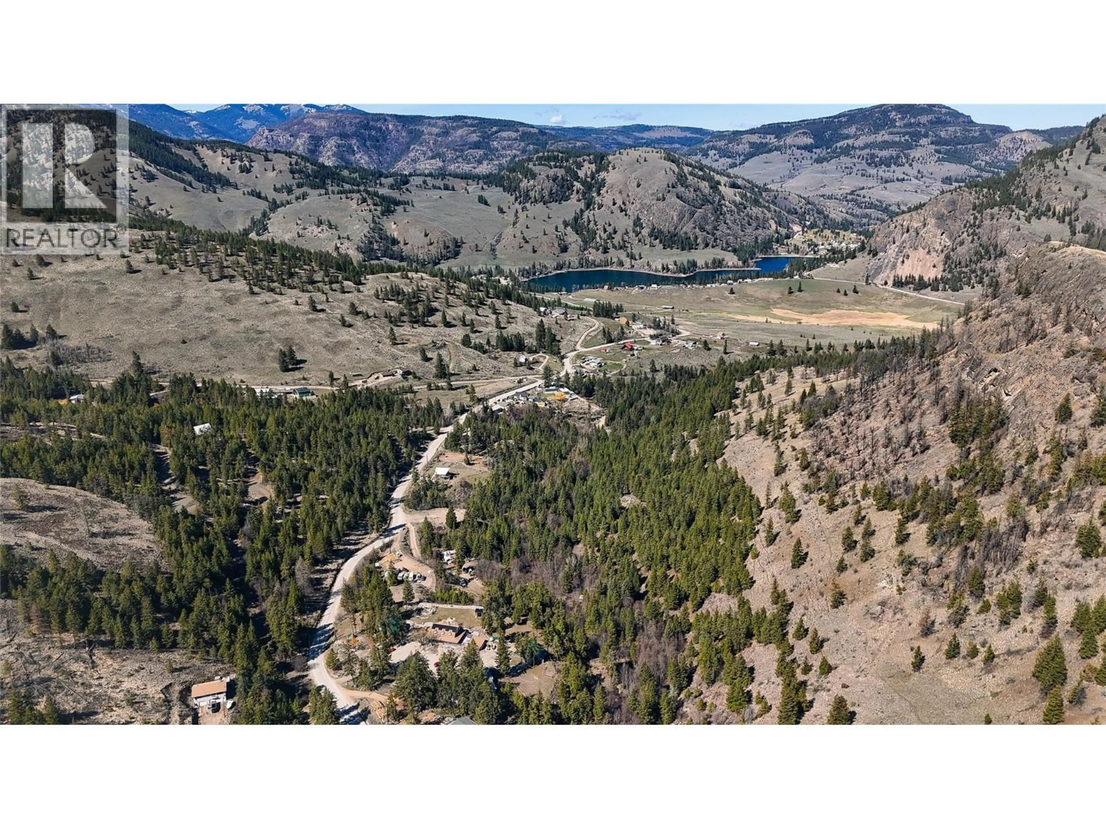 A pic from outside/outdoor area/front of a property/back of a property/a pic from drone, water/lake/river/ocean view for 561 GRAND ORO ROAD, Kaleden British Columbia V0H1K0