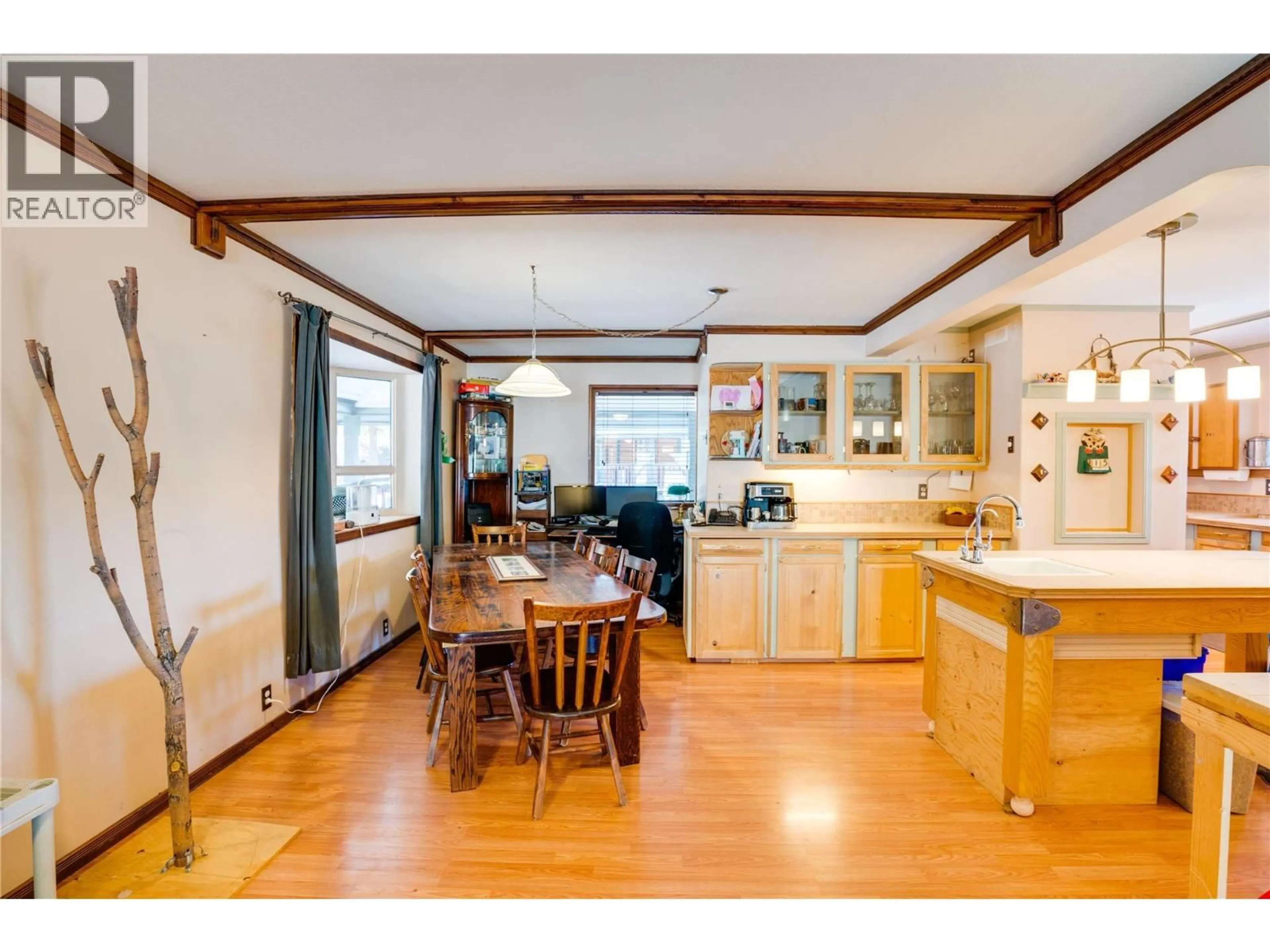 Open concept kitchen, wood/laminate floor for 561 GRAND ORO ROAD, Kaleden British Columbia V0H1K0