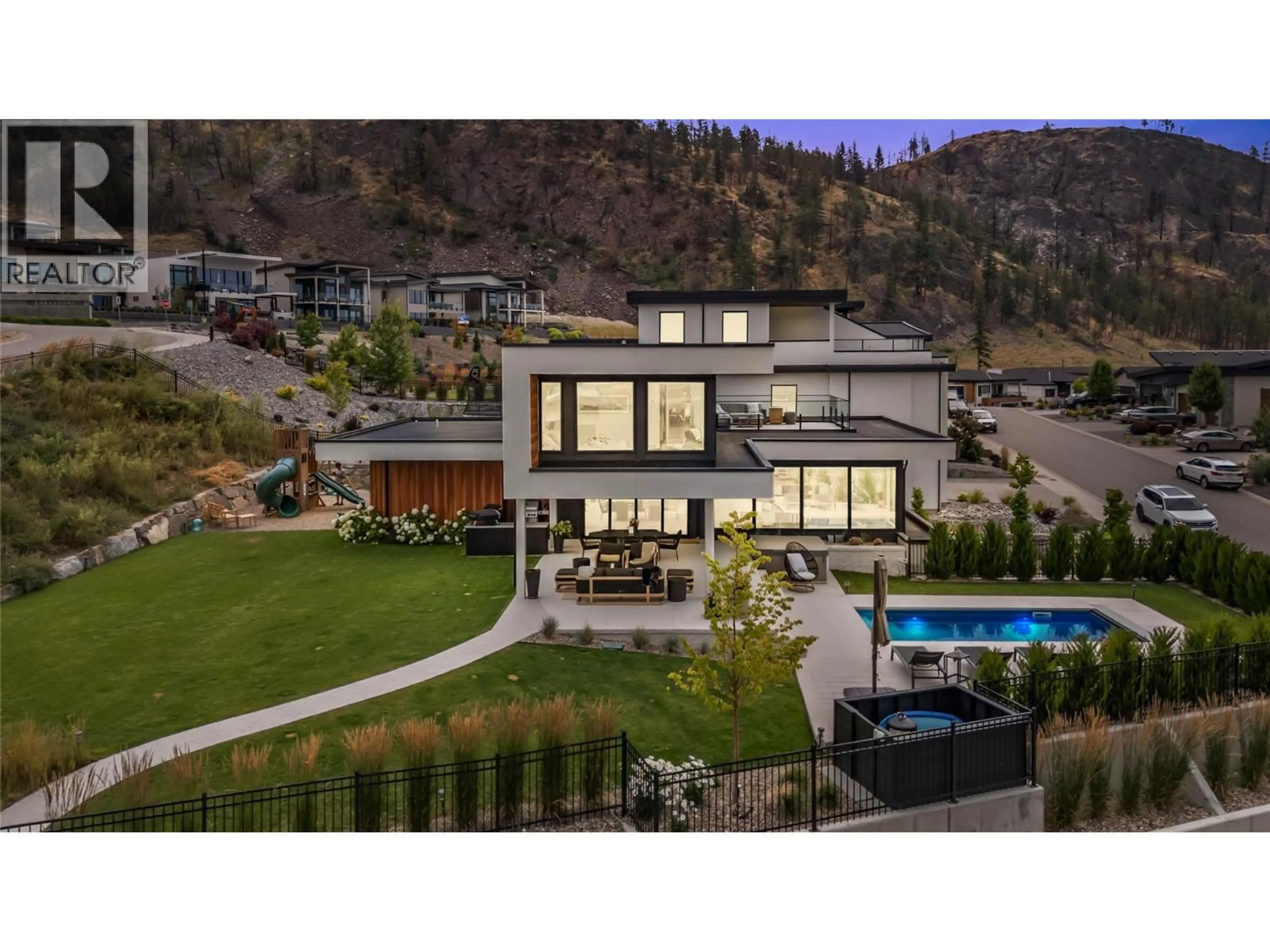A pic from outside/outdoor area/front of a property/back of a property/a pic from drone, mountain view for 9783 CENTRESTONE DRIVE, Lake Country British Columbia V4V0A5