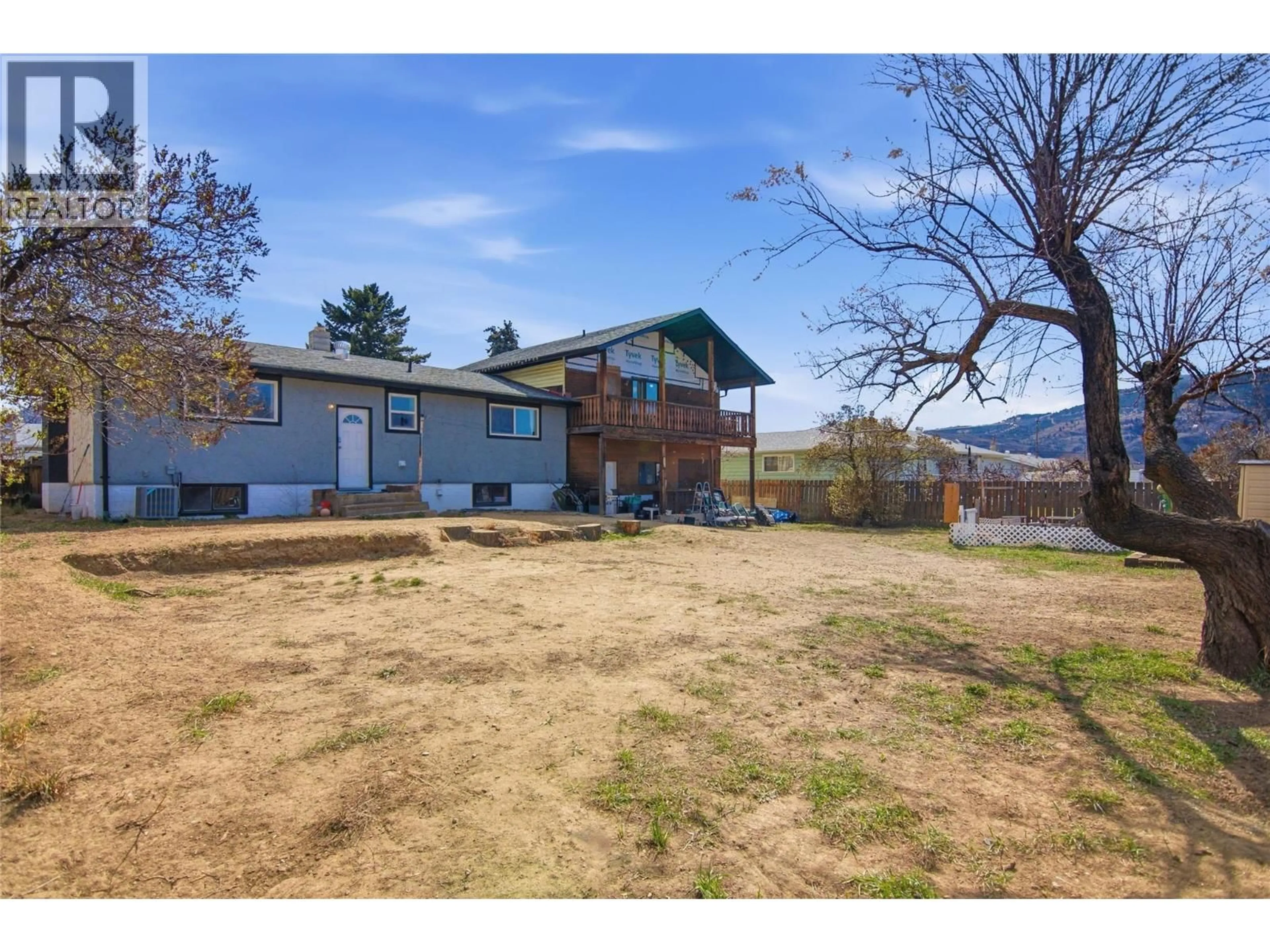 A pic from outside/outdoor area/front of a property/back of a property/a pic from drone, mountain view for 1178 BENTLEY PLACE, Kamloops British Columbia V2B5M5