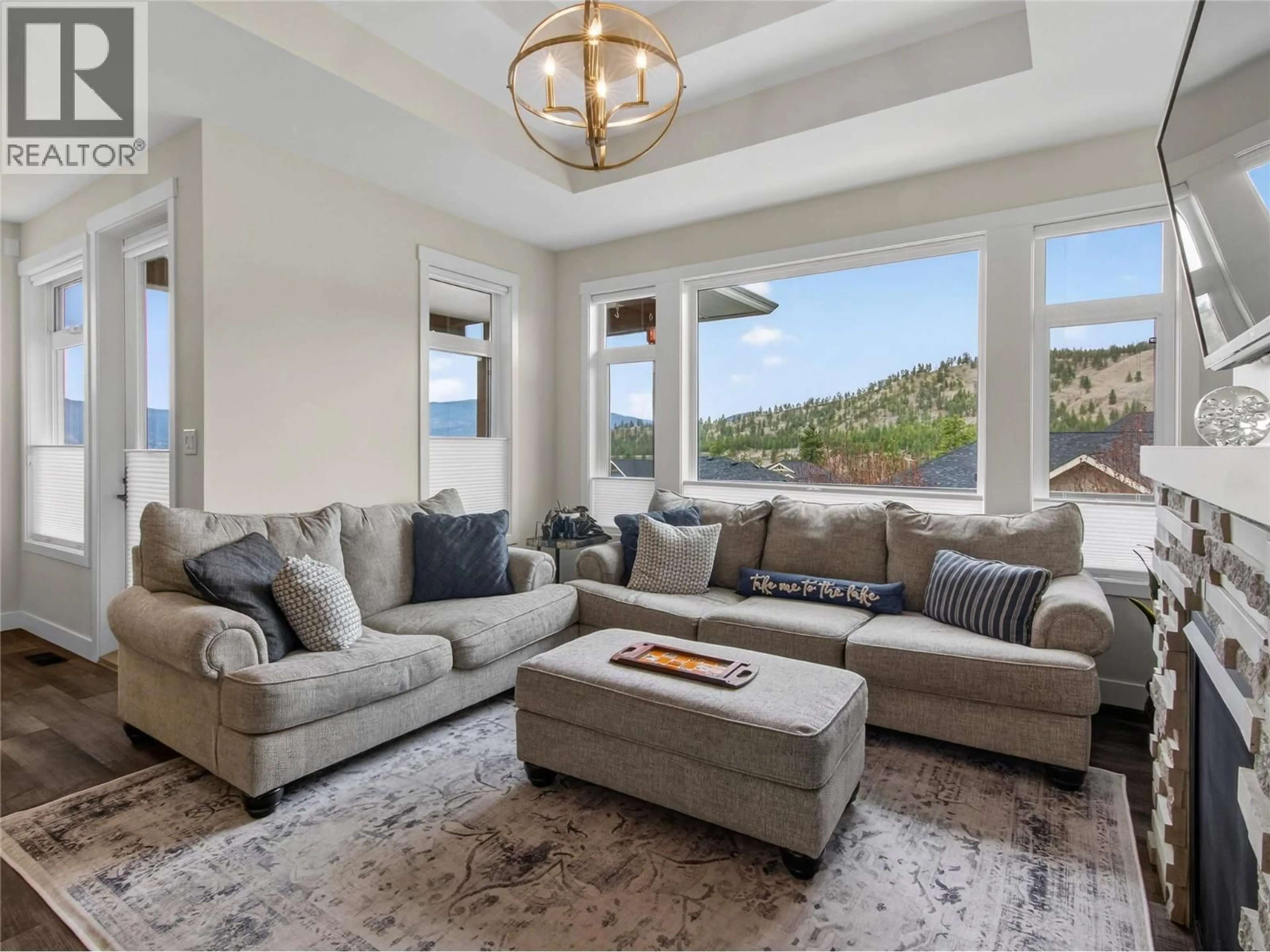 Living room with furniture, unknown for 136 SENDERO CRESCENT, Penticton British Columbia V2A0C3