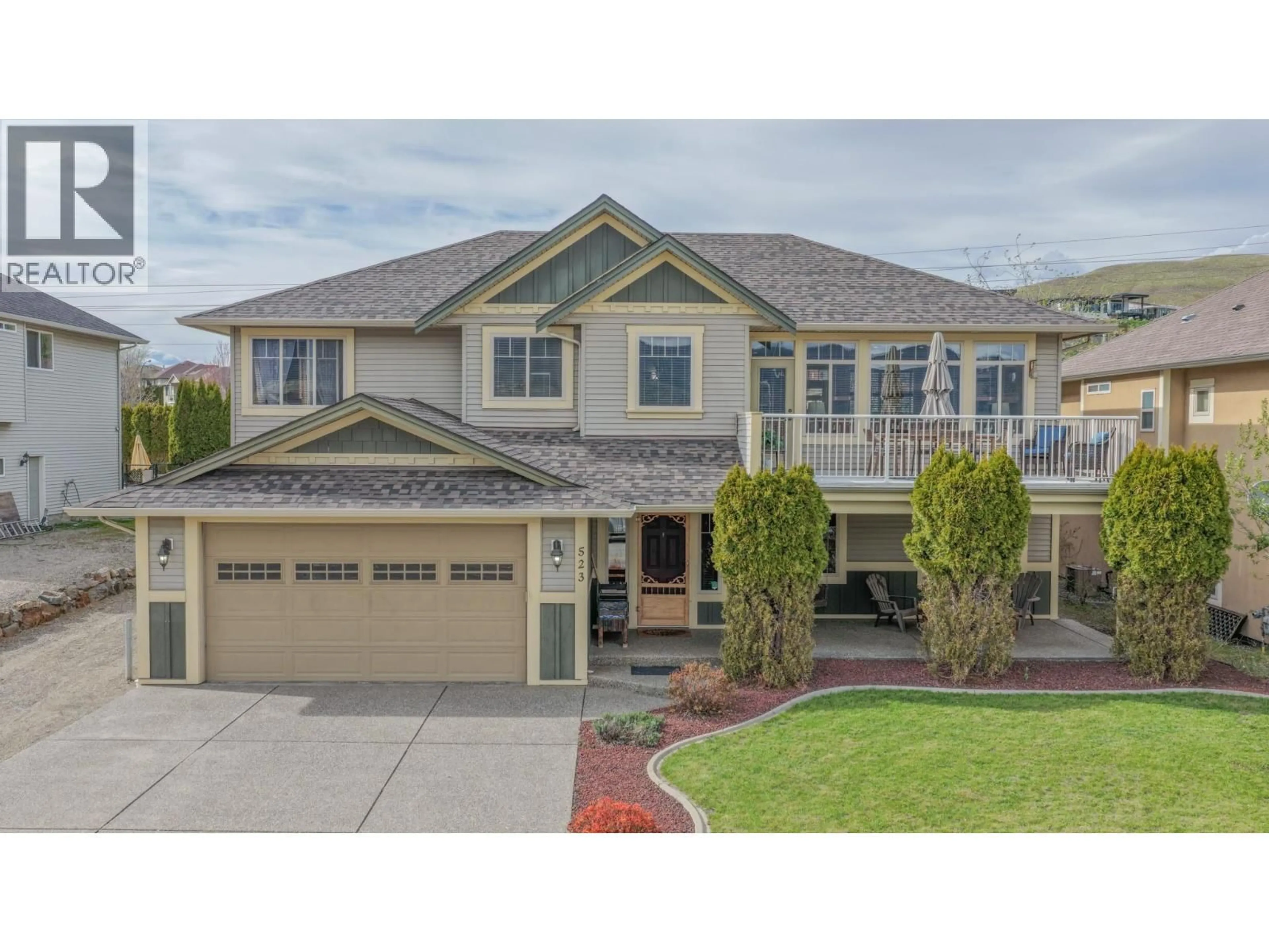 Home with vinyl exterior material, street for 523 MIDDLETON WAY, Coldstream British Columbia V1B3Z8