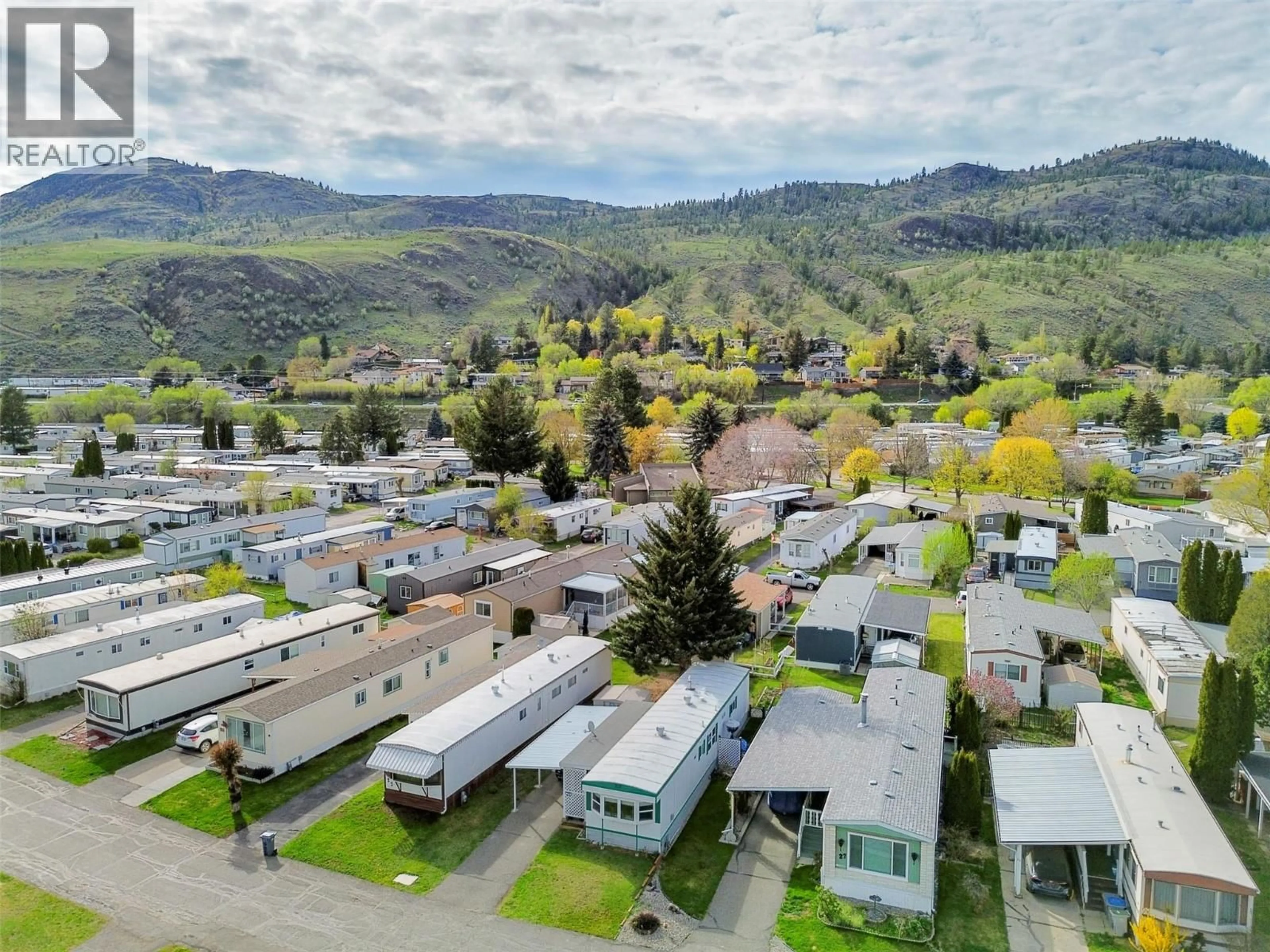 A pic from outside/outdoor area/front of a property/back of a property/a pic from drone, mountain view for 26 - 2400 OAKDALE WAY, Kamloops British Columbia v2b6w6