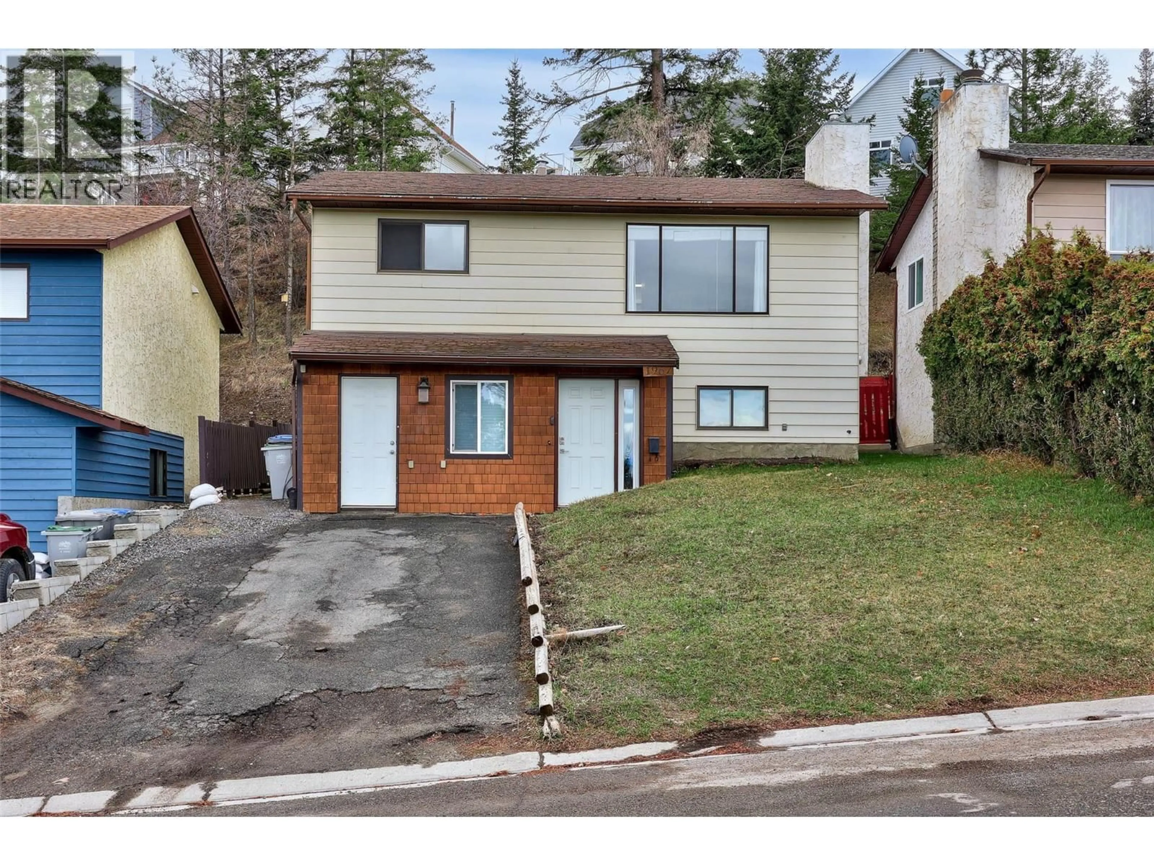 Home with vinyl exterior material, street for 1967 HARRISON WAY, Kamloops British Columbia V1S1M8