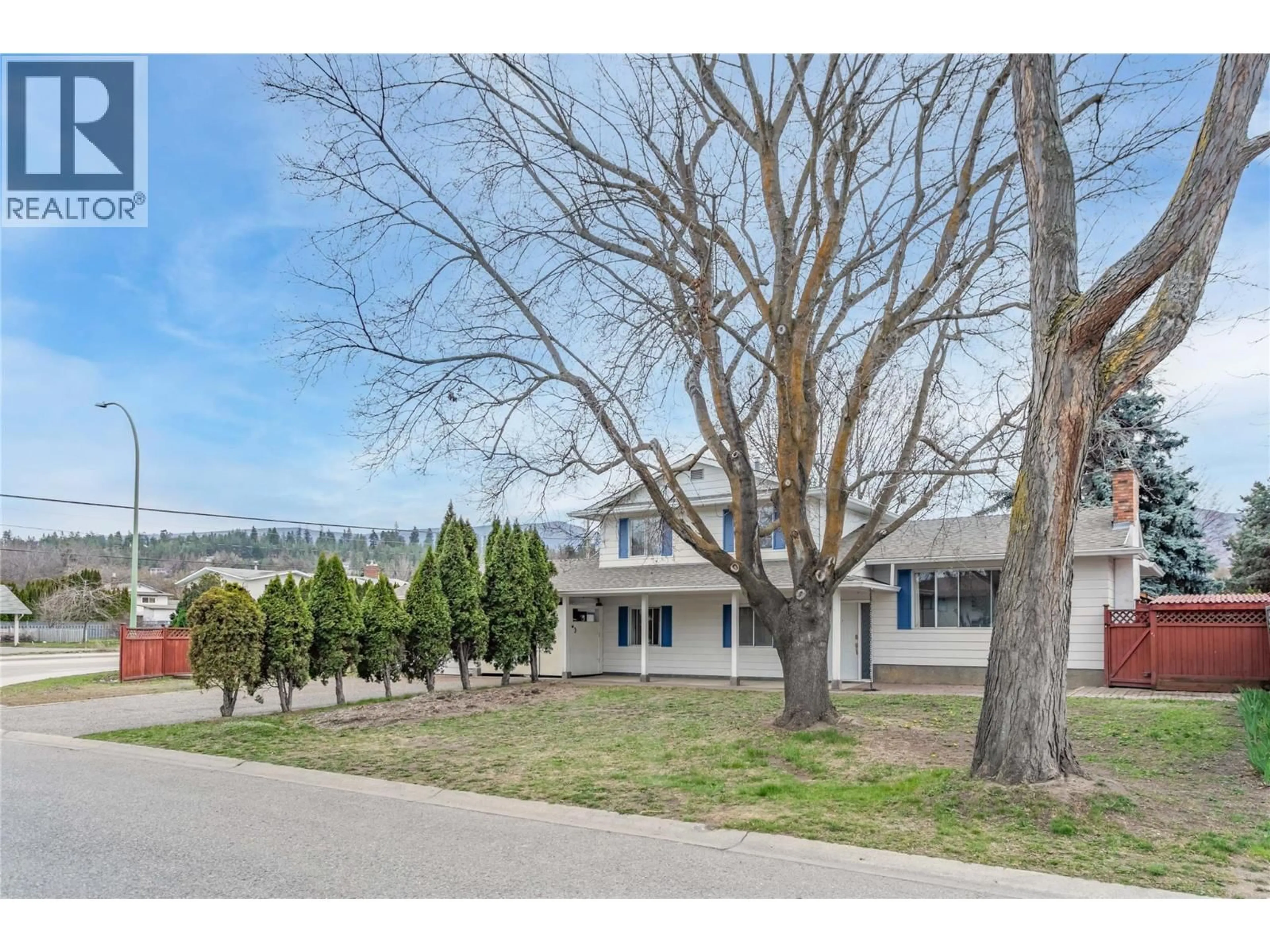 A pic from outside/outdoor area/front of a property/back of a property/a pic from drone, unknown for 693 PARET PLACE, Kelowna British Columbia V1W2K6