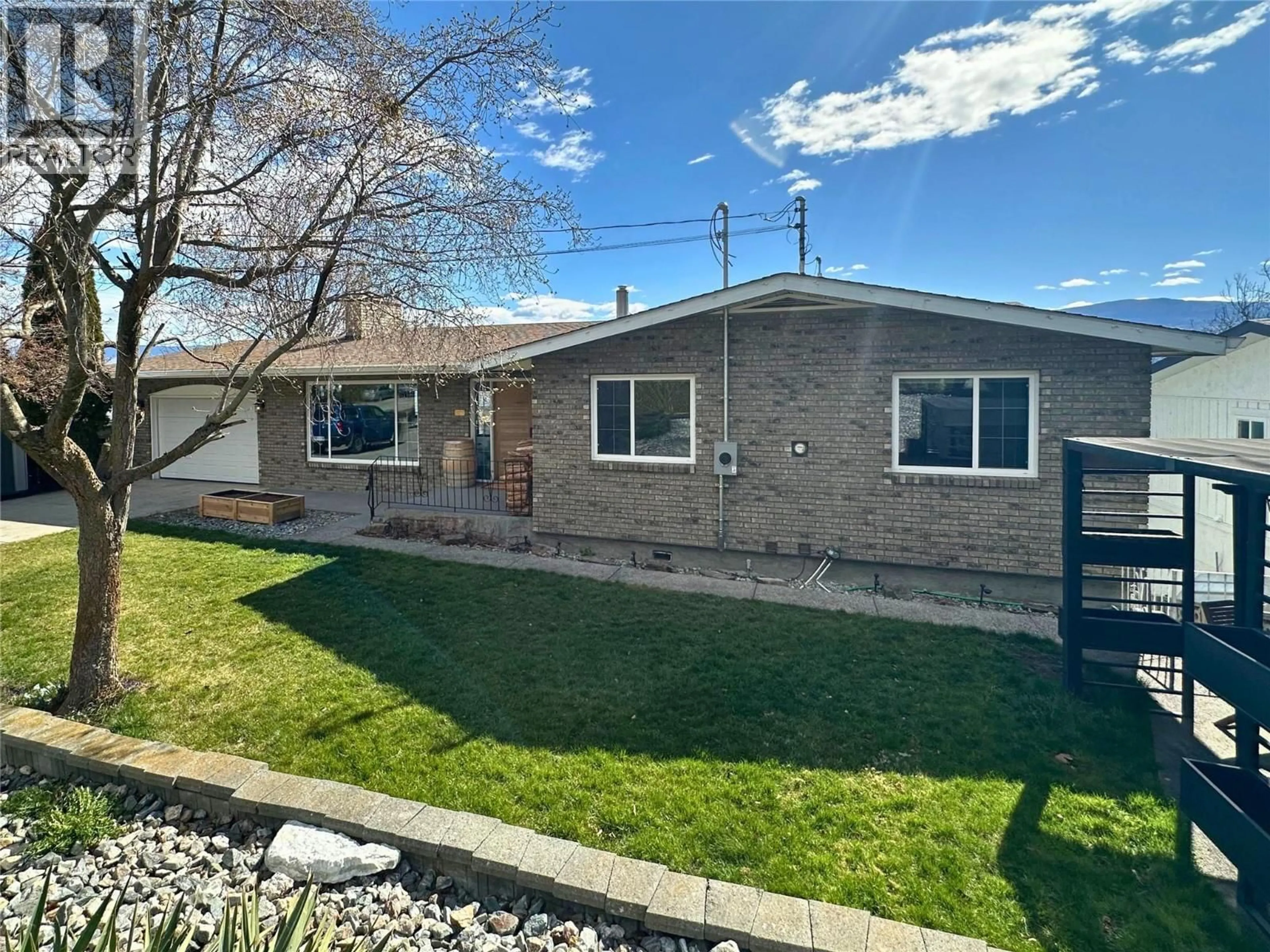 A pic from outside/outdoor area/front of a property/back of a property/a pic from drone, street for 2741 BENEDICK ROAD, West Kelowna British Columbia V1Z1V1