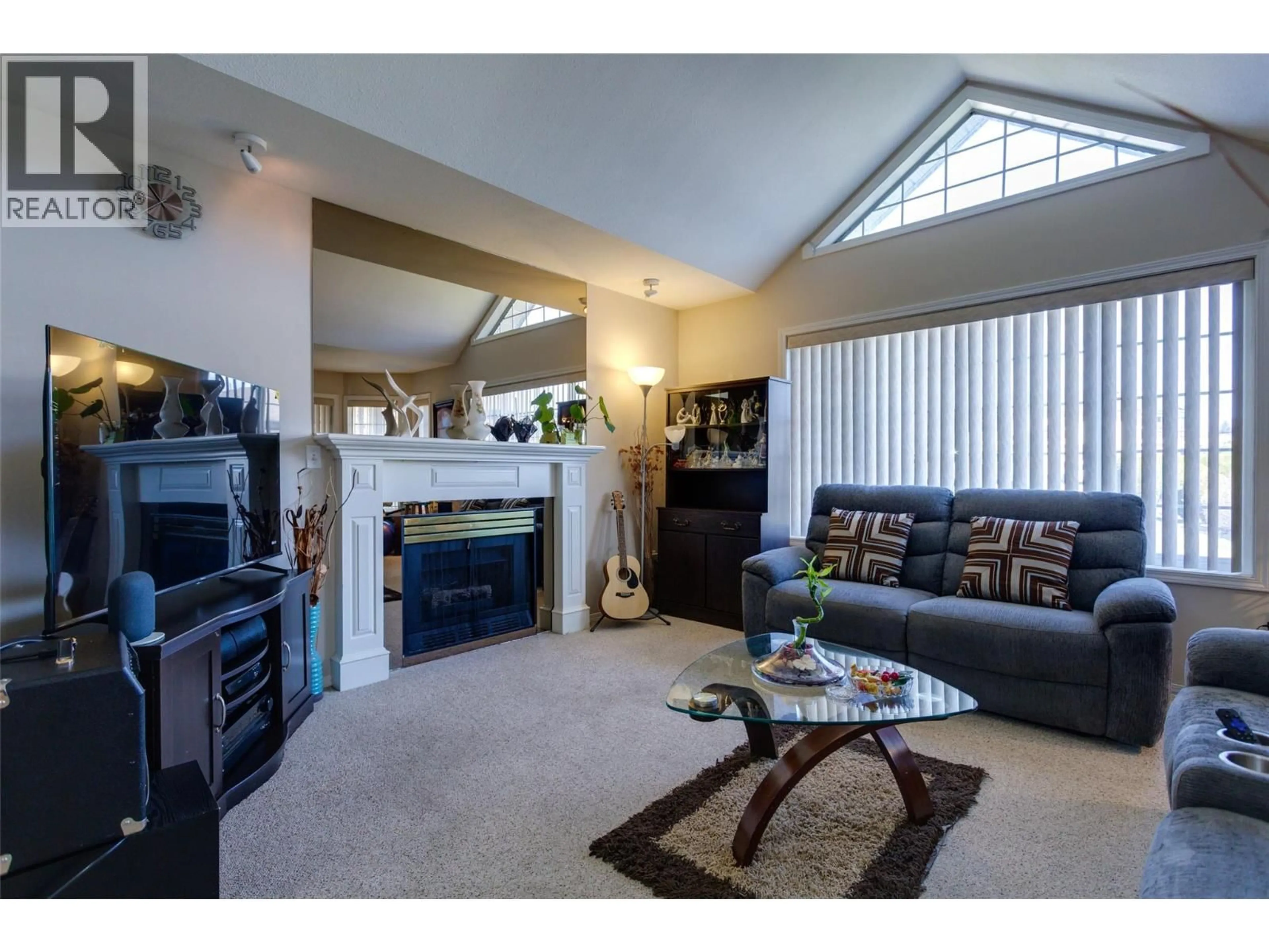 Living room with furniture, wood/laminate floor for 120-1 - 7841 97 HIGHWAY, Kelowna British Columbia V4V1E7