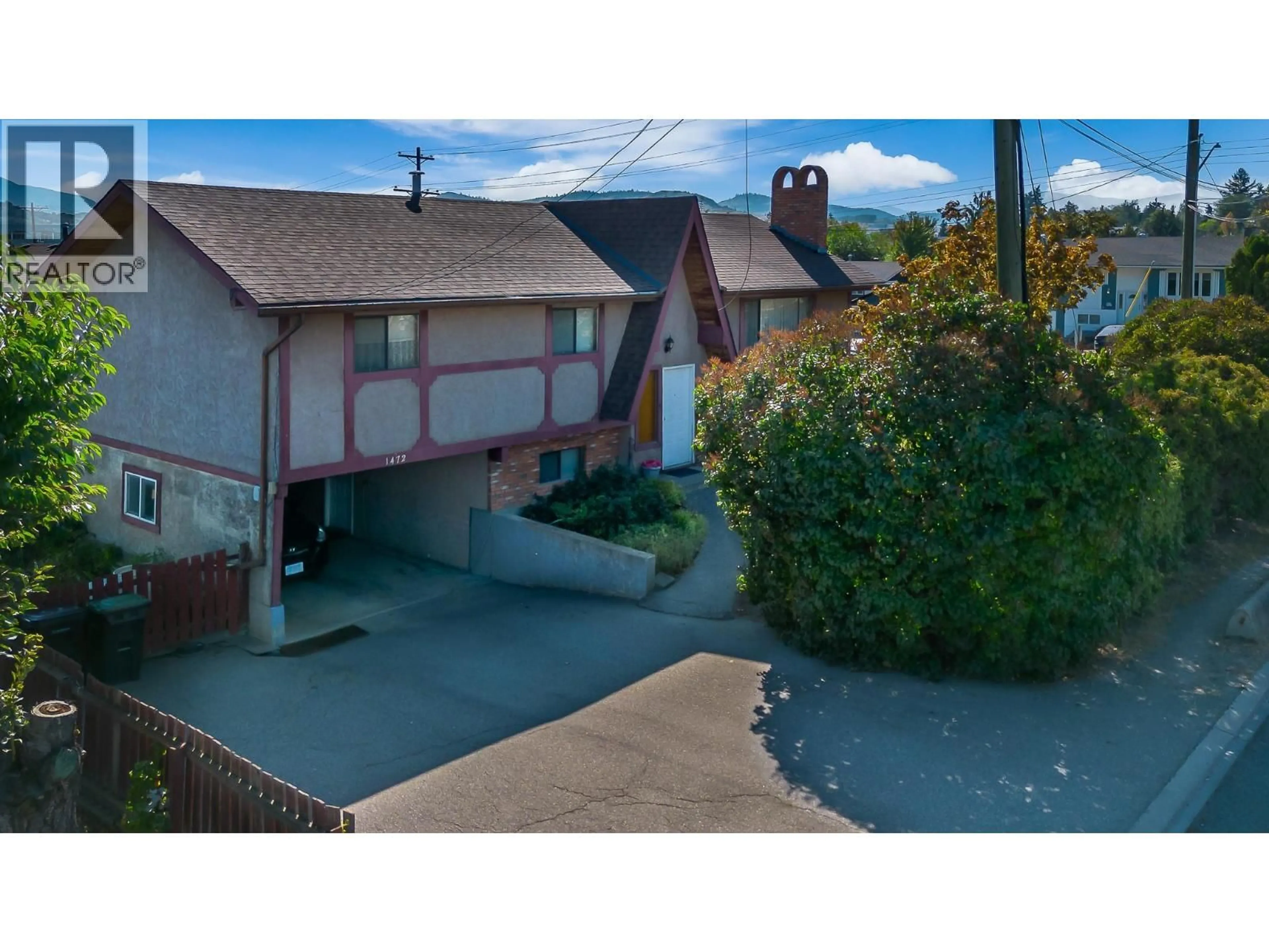 A pic from outside/outdoor area/front of a property/back of a property/a pic from drone, street for 1472 25 AVENUE, Vernon British Columbia V1T1M5