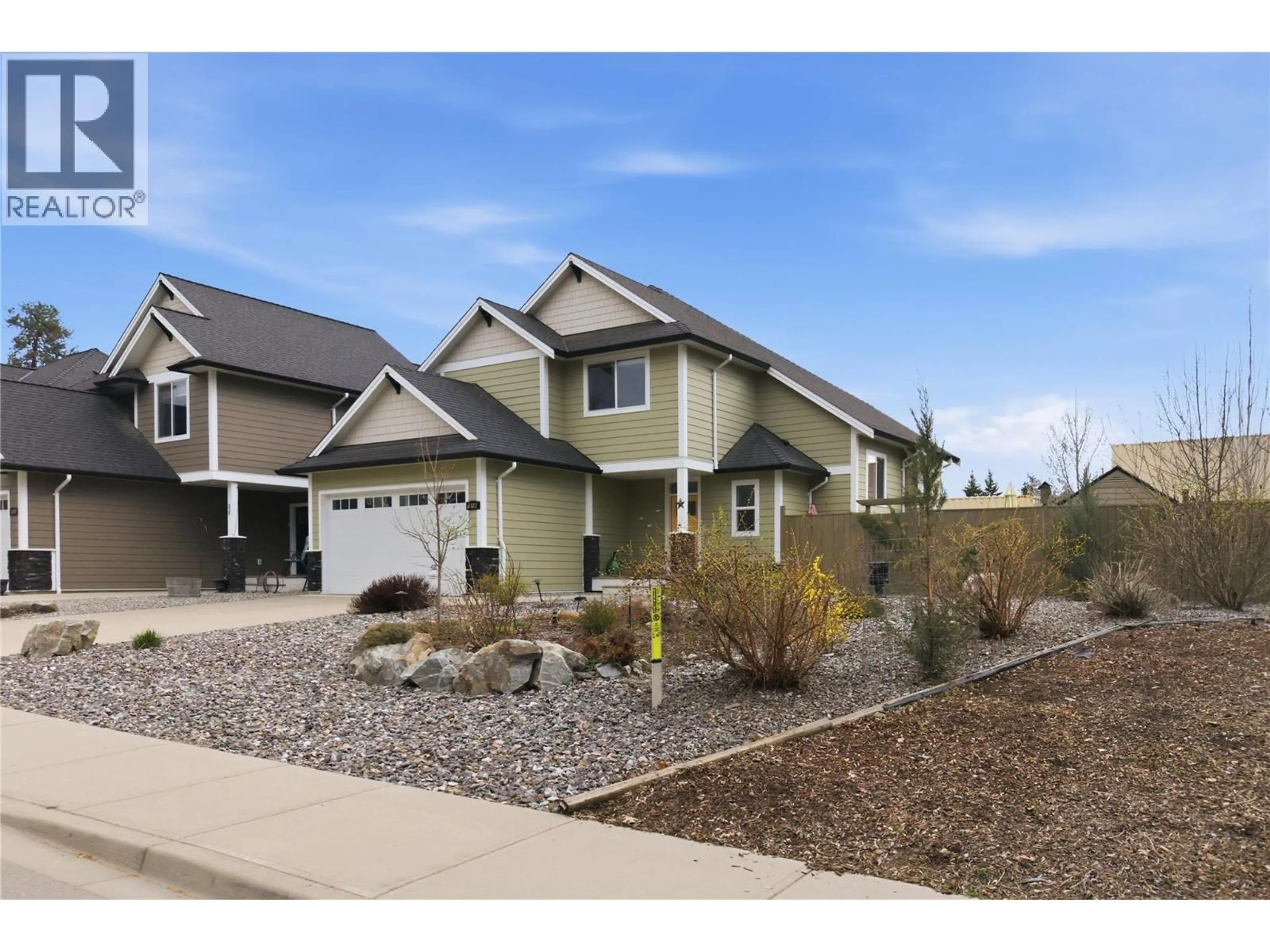 Home with vinyl exterior material, street for 1812 50 AVENUE, Vernon British Columbia V1T4E8