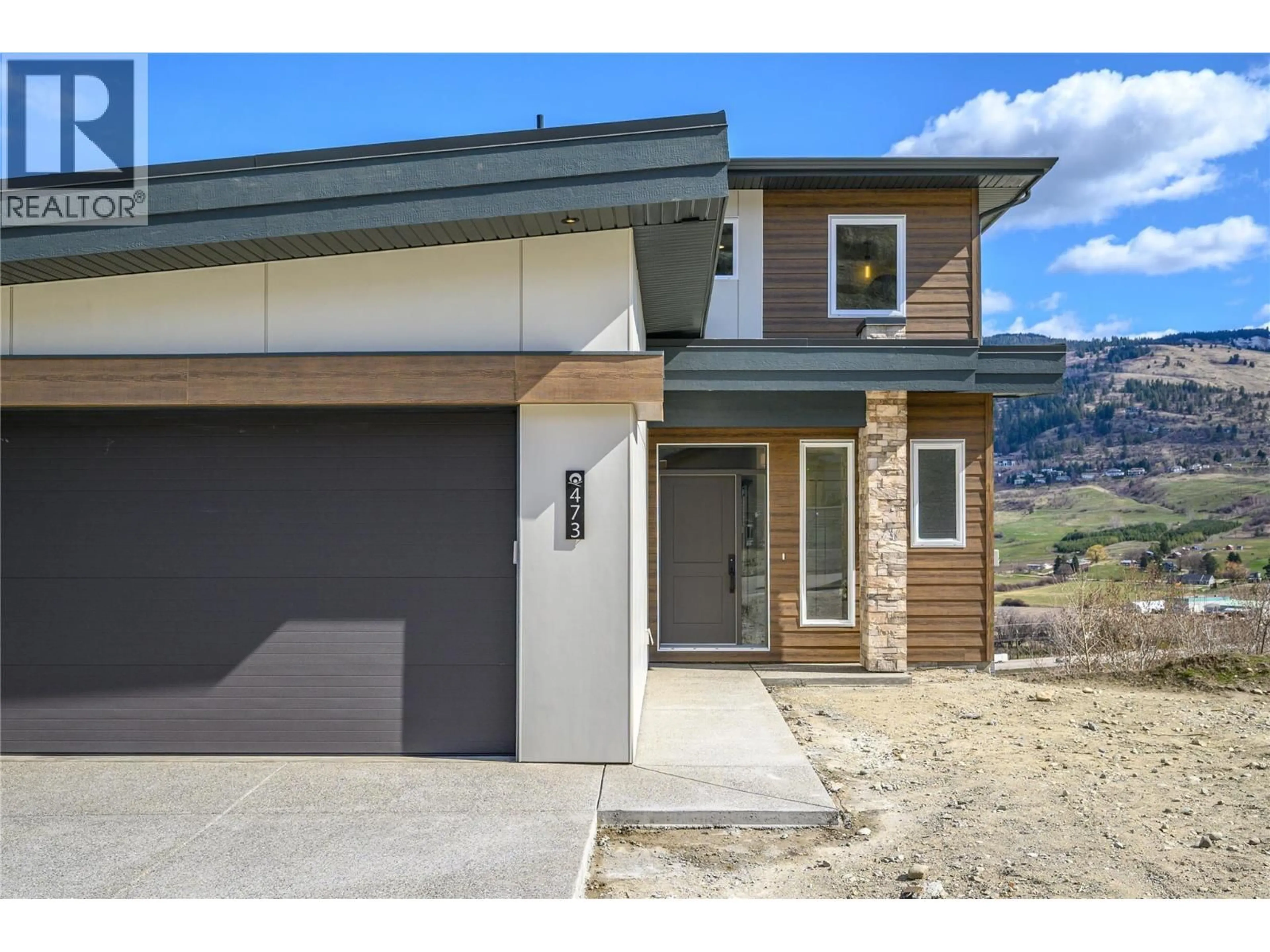 Home with vinyl exterior material, street for 473 MORNINGVIEW DRIVE, Coldstream British Columbia V1B2M4