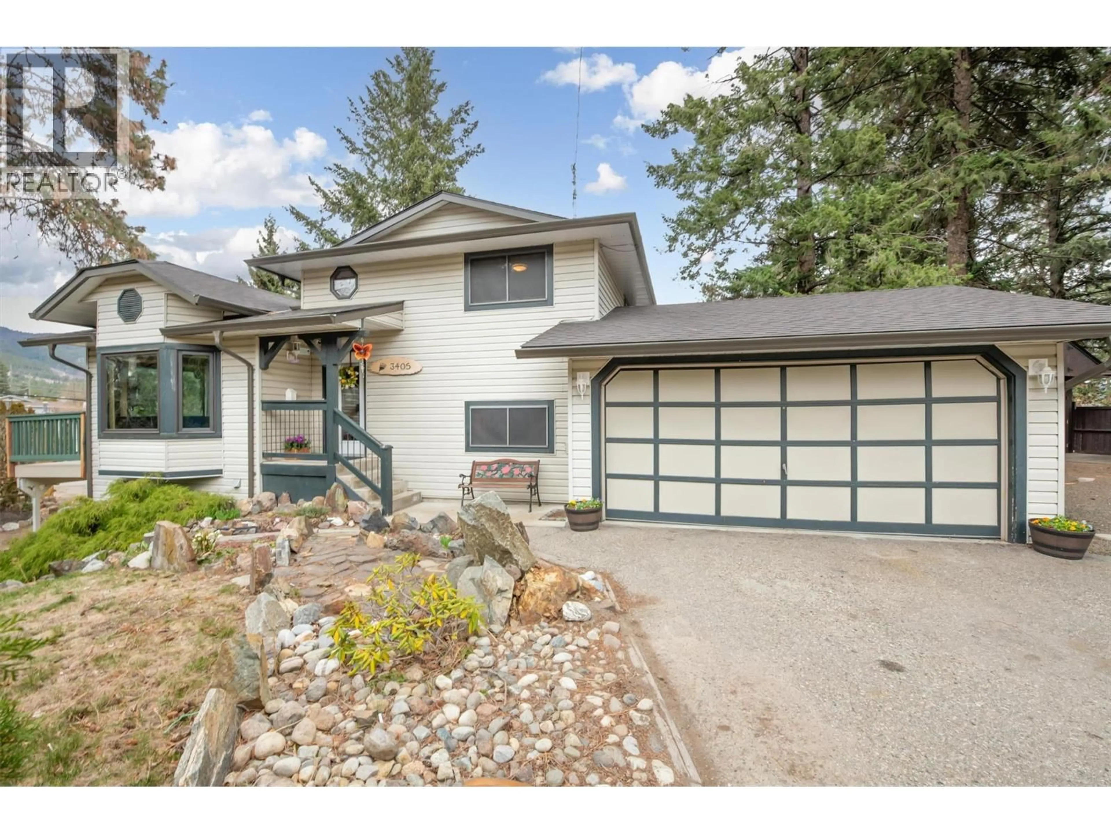 Home with vinyl exterior material, street for 3405 MCGINNIS ROAD, West Kelowna British Columbia V4T1B5