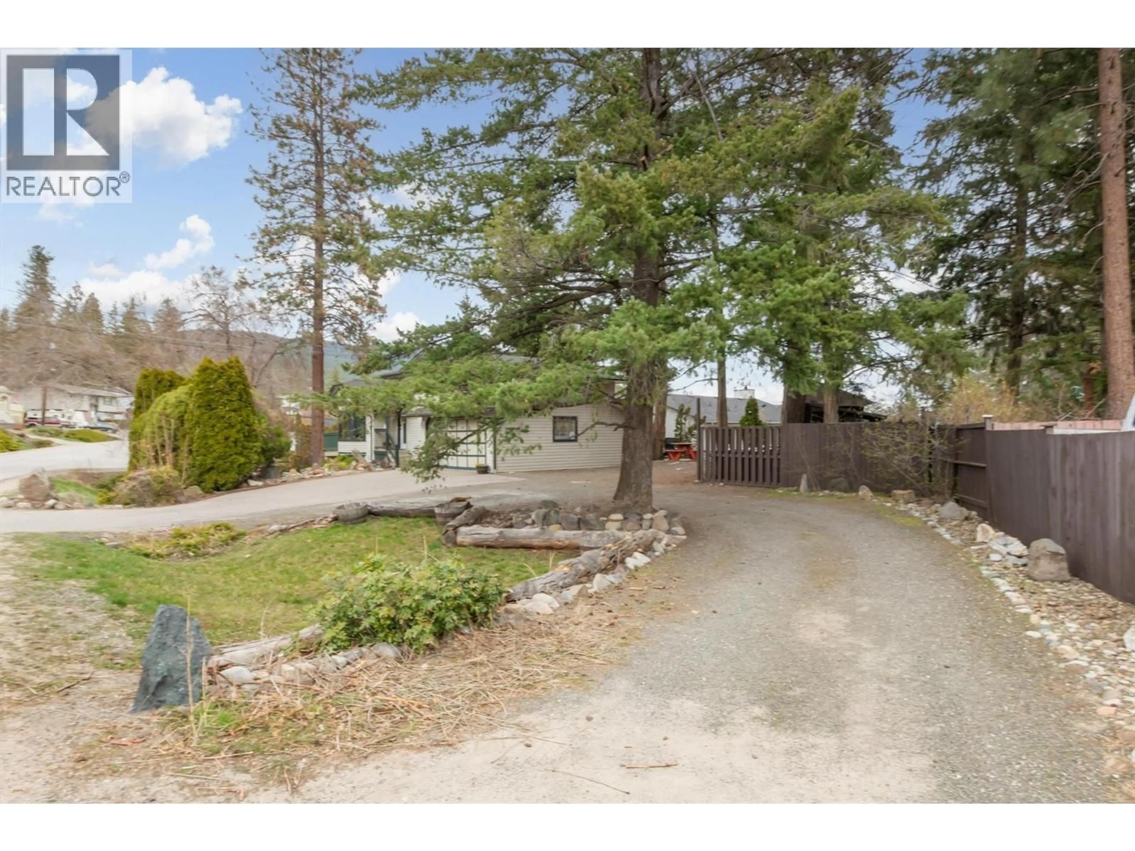 A pic from outside/outdoor area/front of a property/back of a property/a pic from drone, unknown for 3405 MCGINNIS ROAD, West Kelowna British Columbia V4T1B5