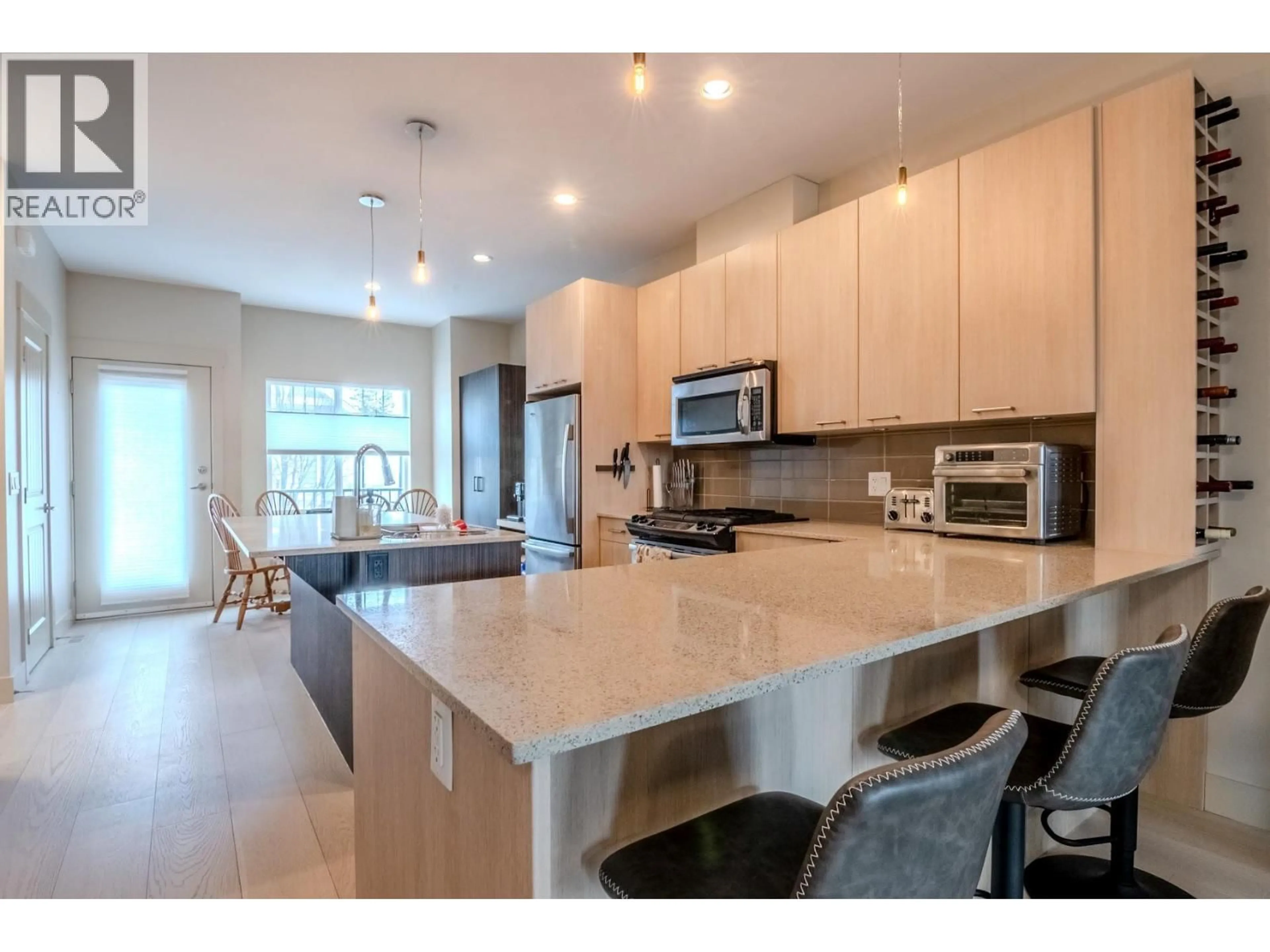 Open concept kitchen, ceramic/tile floor for 10 - 600 SHERWOOD ROAD, Kelowna British Columbia V1W5K1