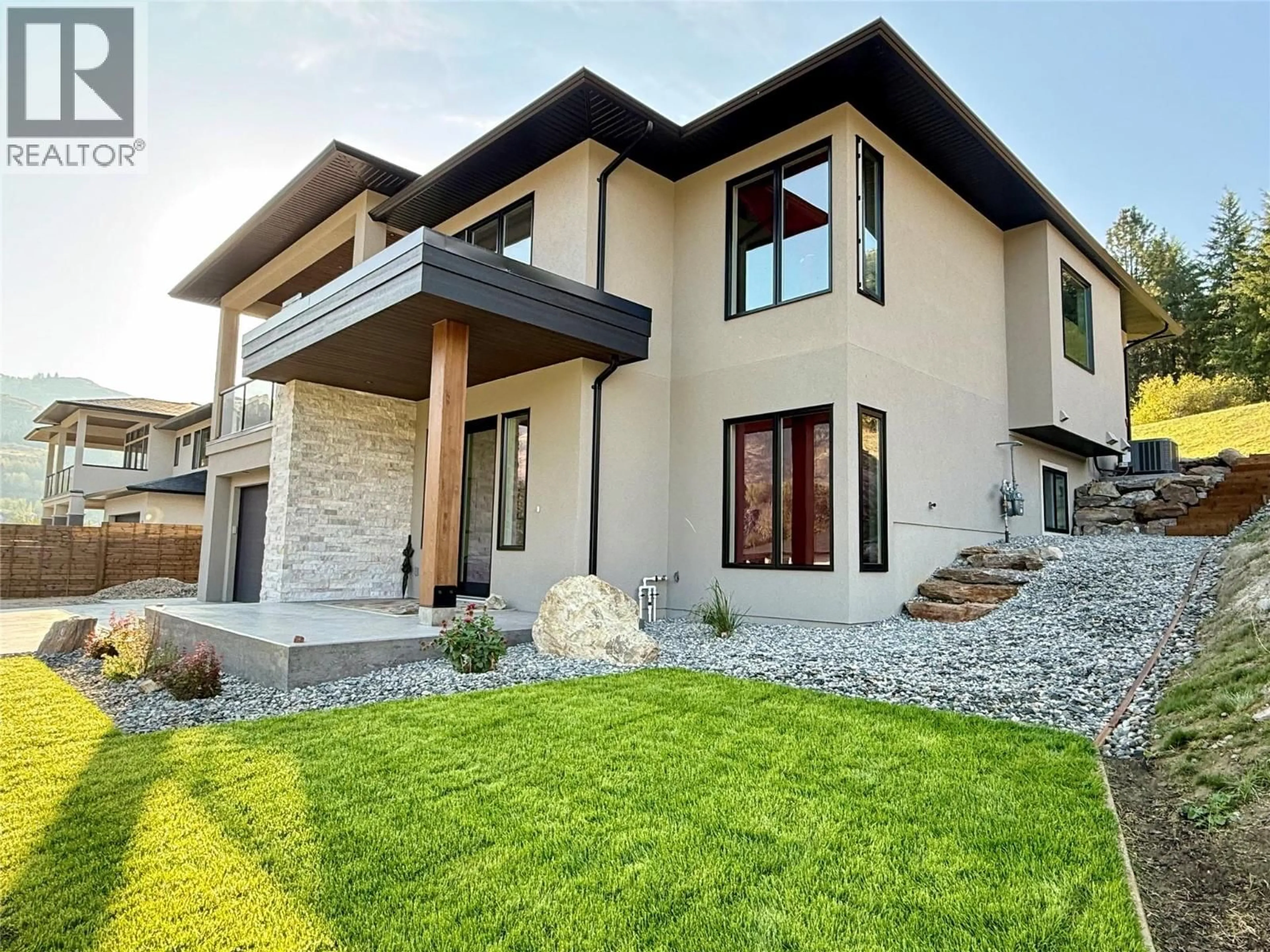 Home with brick exterior material, street for 8781 RIVERSIDE DRIVE, Grand Forks British Columbia V0H1H0