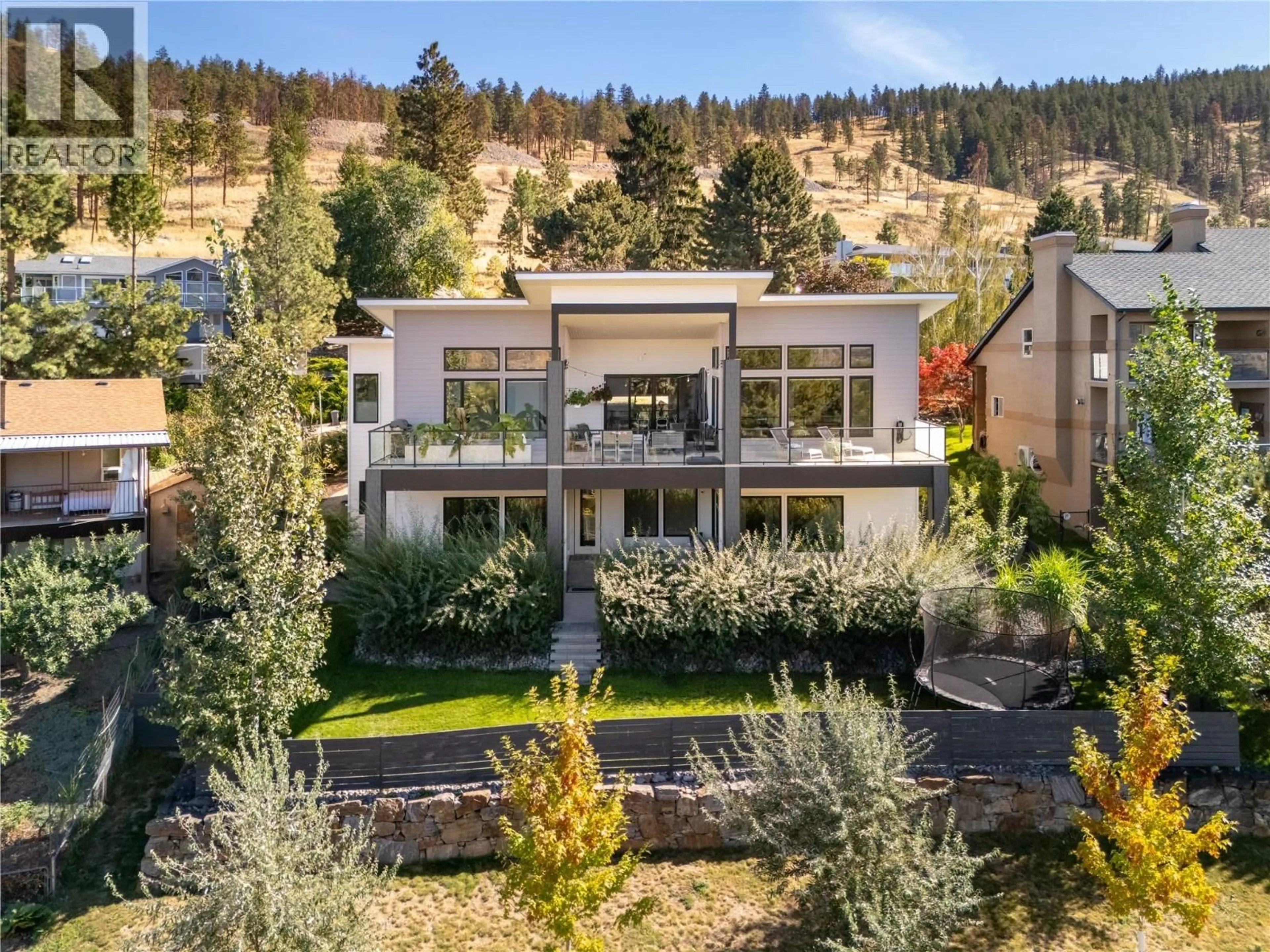 A pic from outside/outdoor area/front of a property/back of a property/a pic from drone, mountain view for 2155 PALY ROAD, Kelowna British Columbia V1V2B9