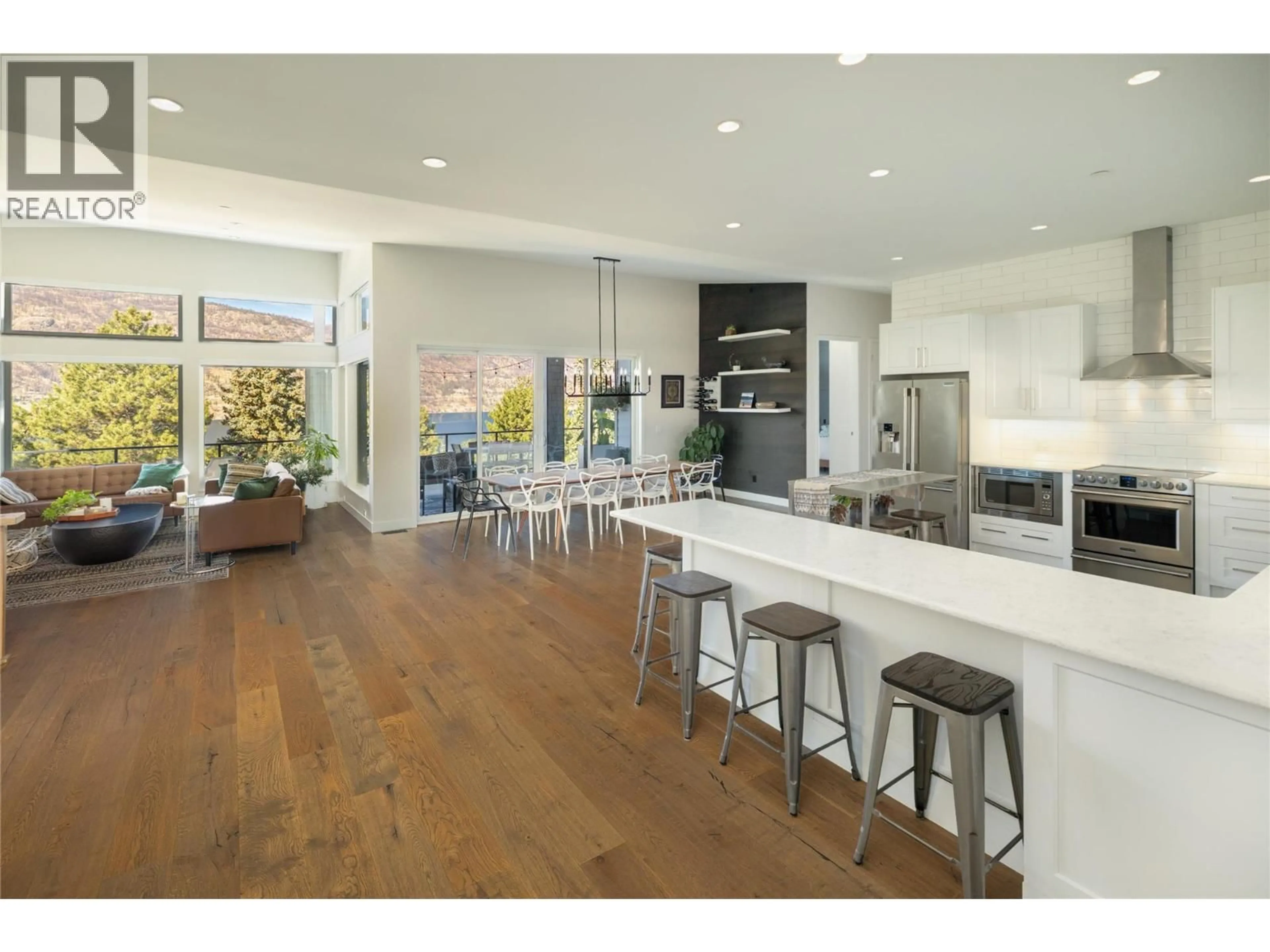 Open concept kitchen, wood/laminate floor for 2155 PALY ROAD, Kelowna British Columbia V1V2B9