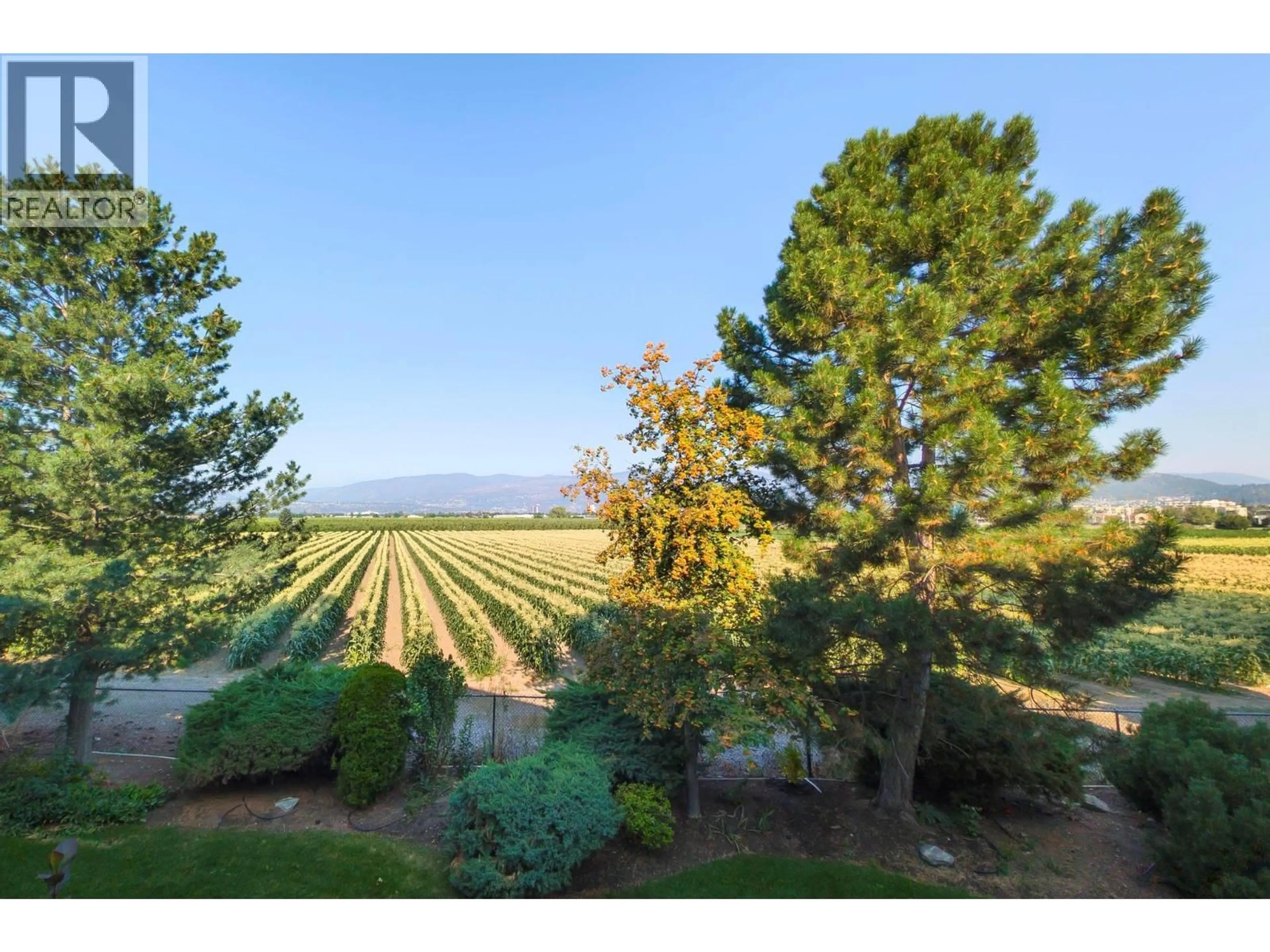 A pic from outside/outdoor area/front of a property/back of a property/a pic from drone, mountain view for 211 - 2300 BENVOULIN ROAD, Kelowna British Columbia V1W2C6