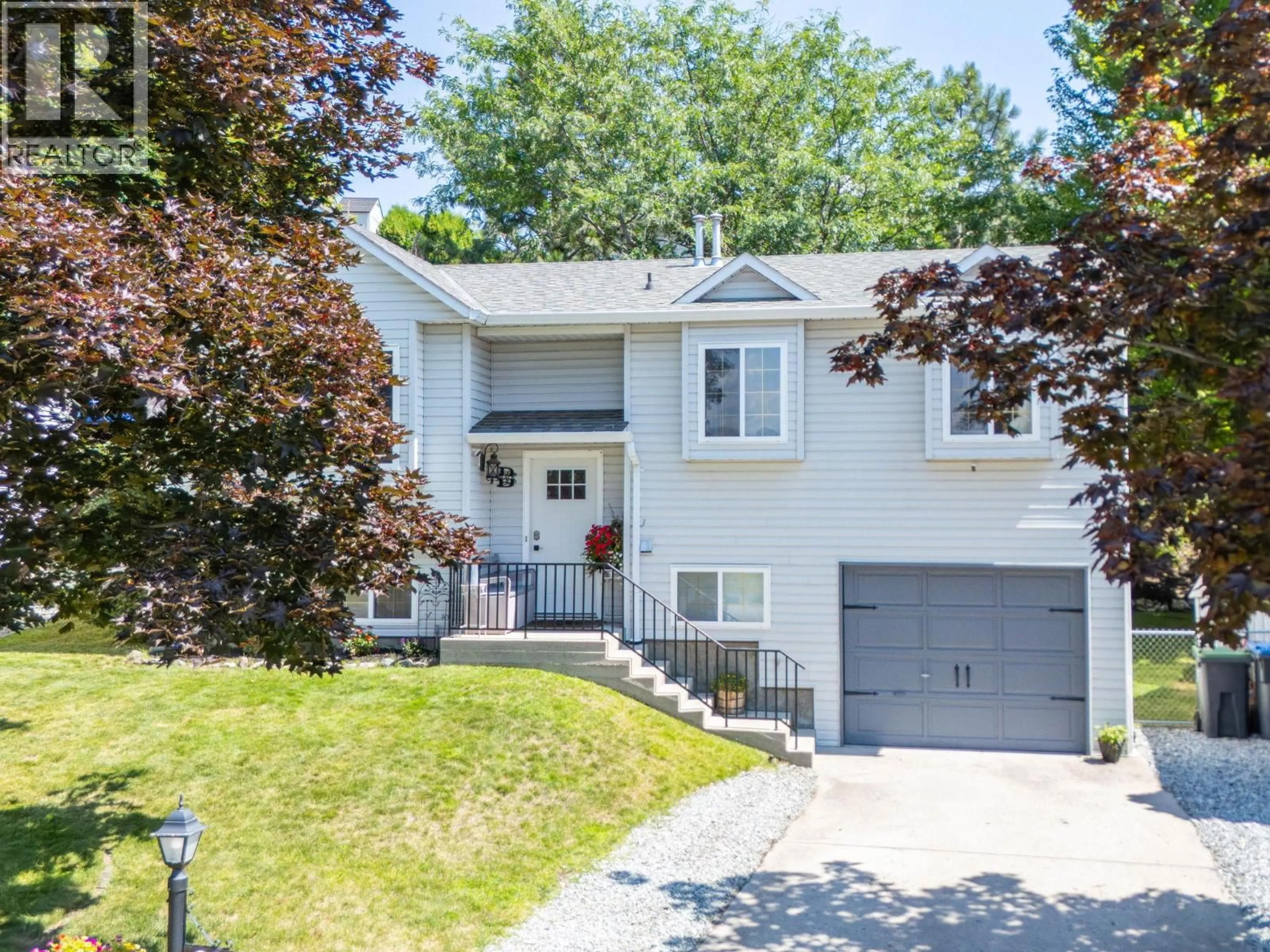 Home with vinyl exterior material, street for 24 - 6100 OLD VERNON ROAD, Ellison British Columbia V1Z7T8