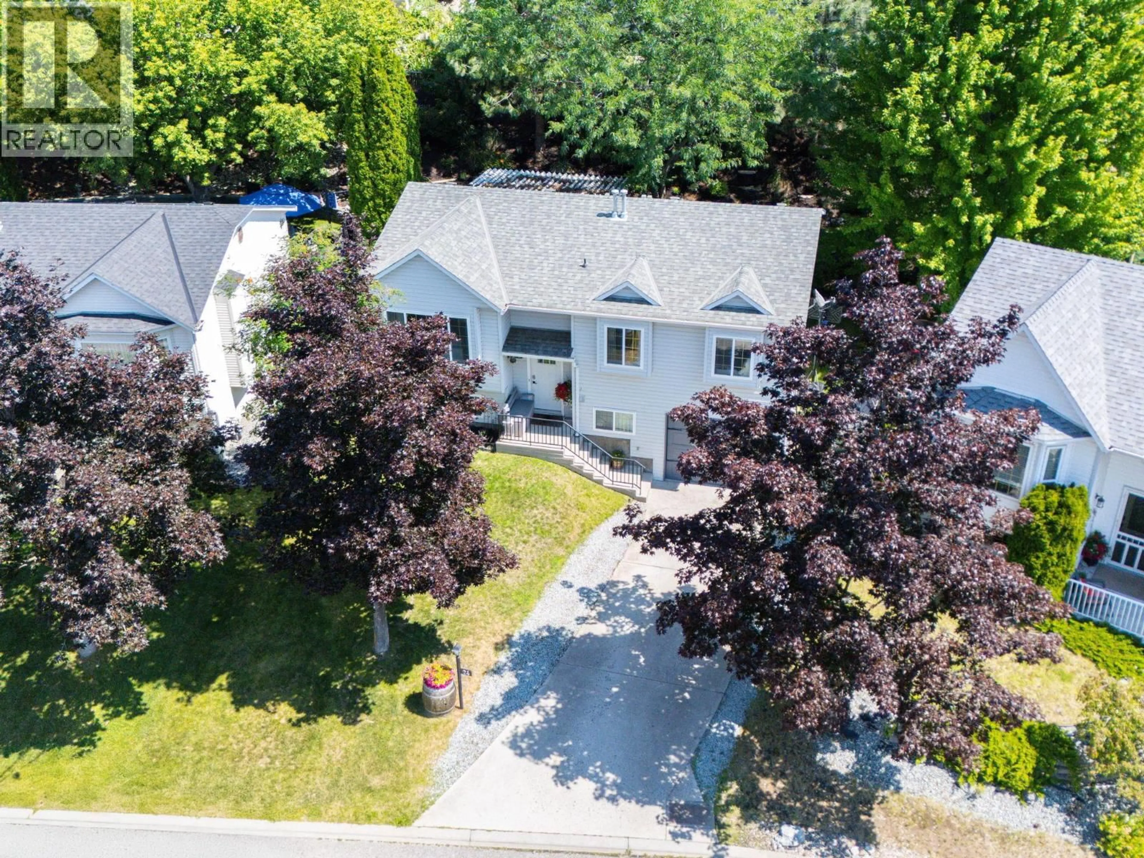 A pic from outside/outdoor area/front of a property/back of a property/a pic from drone, street for 24 - 6100 OLD VERNON ROAD, Ellison British Columbia V1Z7T8