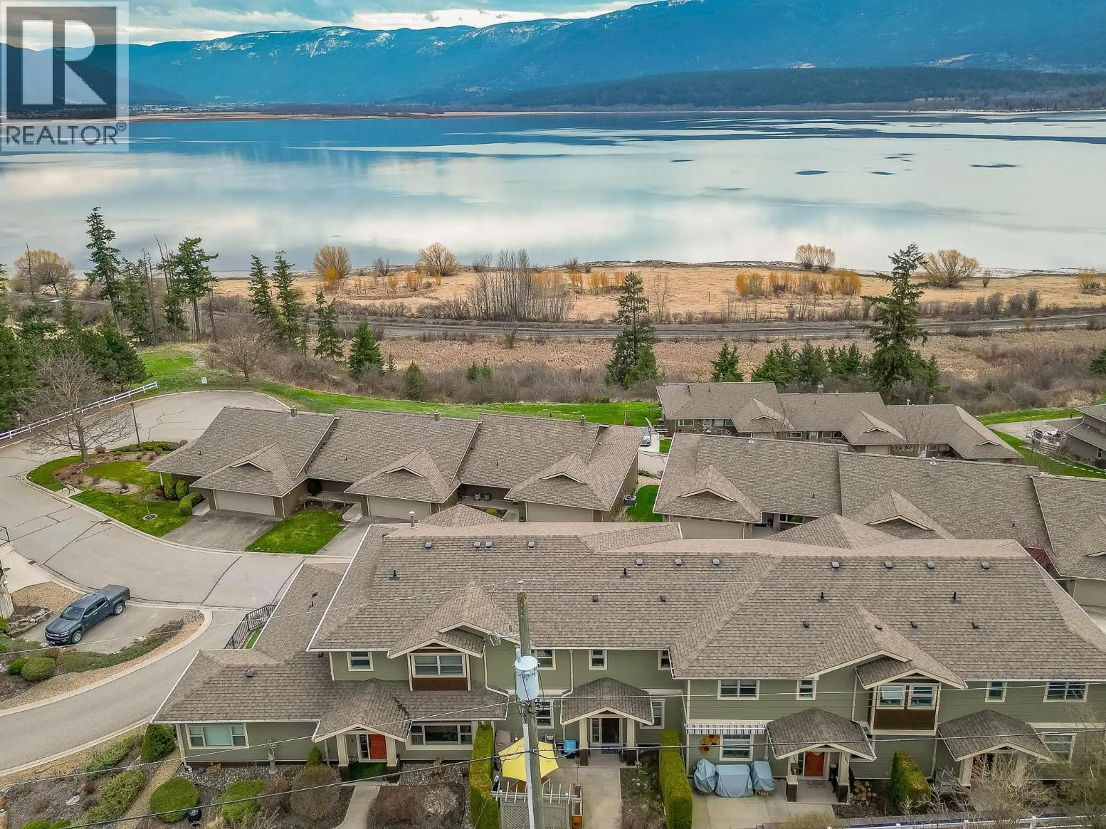 A pic from outside/outdoor area/front of a property/back of a property/a pic from drone, water/lake/river/ocean view for 4420 14 STREET NORTHEAST, Salmon Arm British Columbia V1E1P9