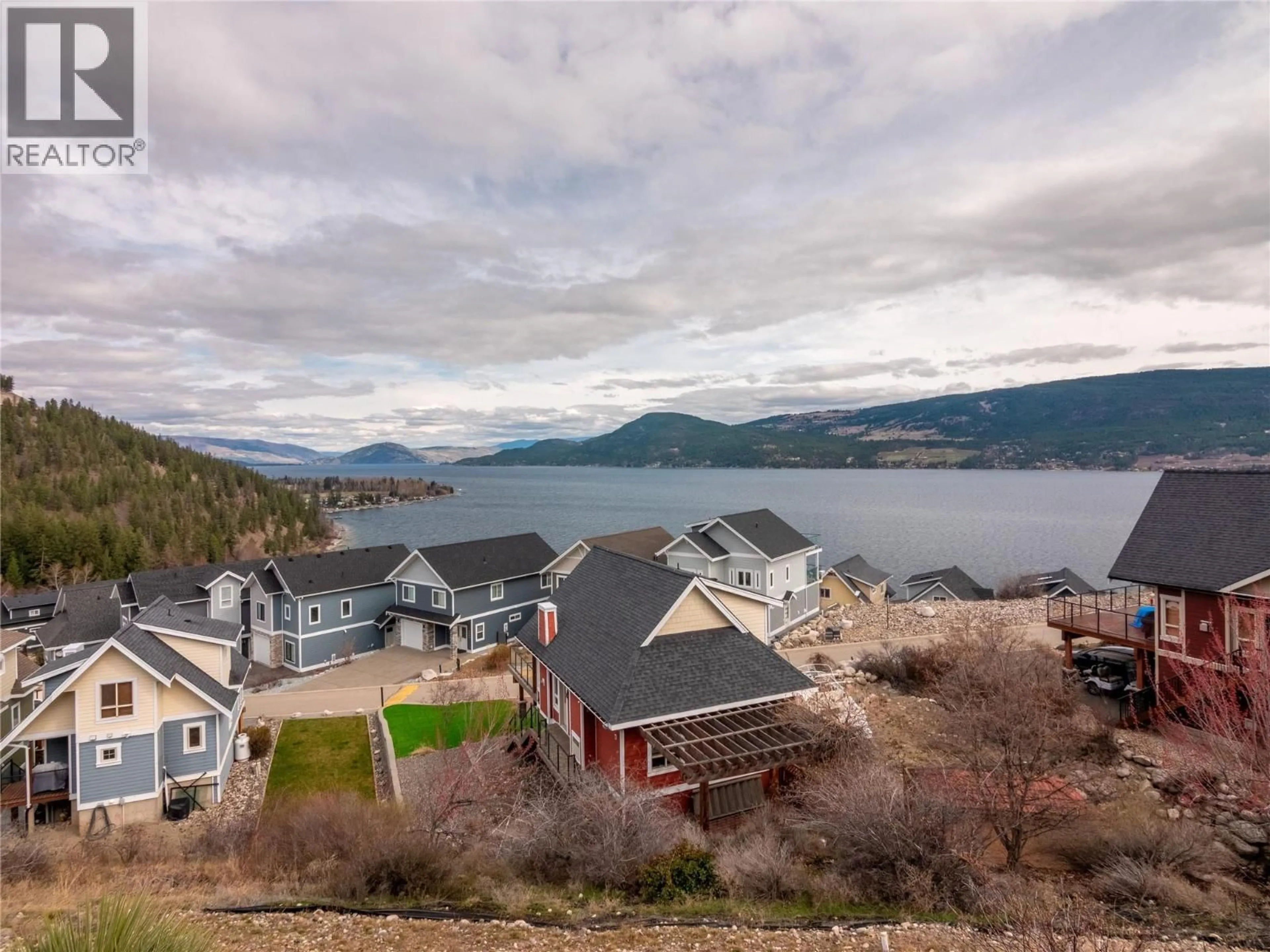 A pic from outside/outdoor area/front of a property/back of a property/a pic from drone, water/lake/river/ocean view for 6774 LA PALMA LOOP, Kelowna British Columbia V1Z3R8