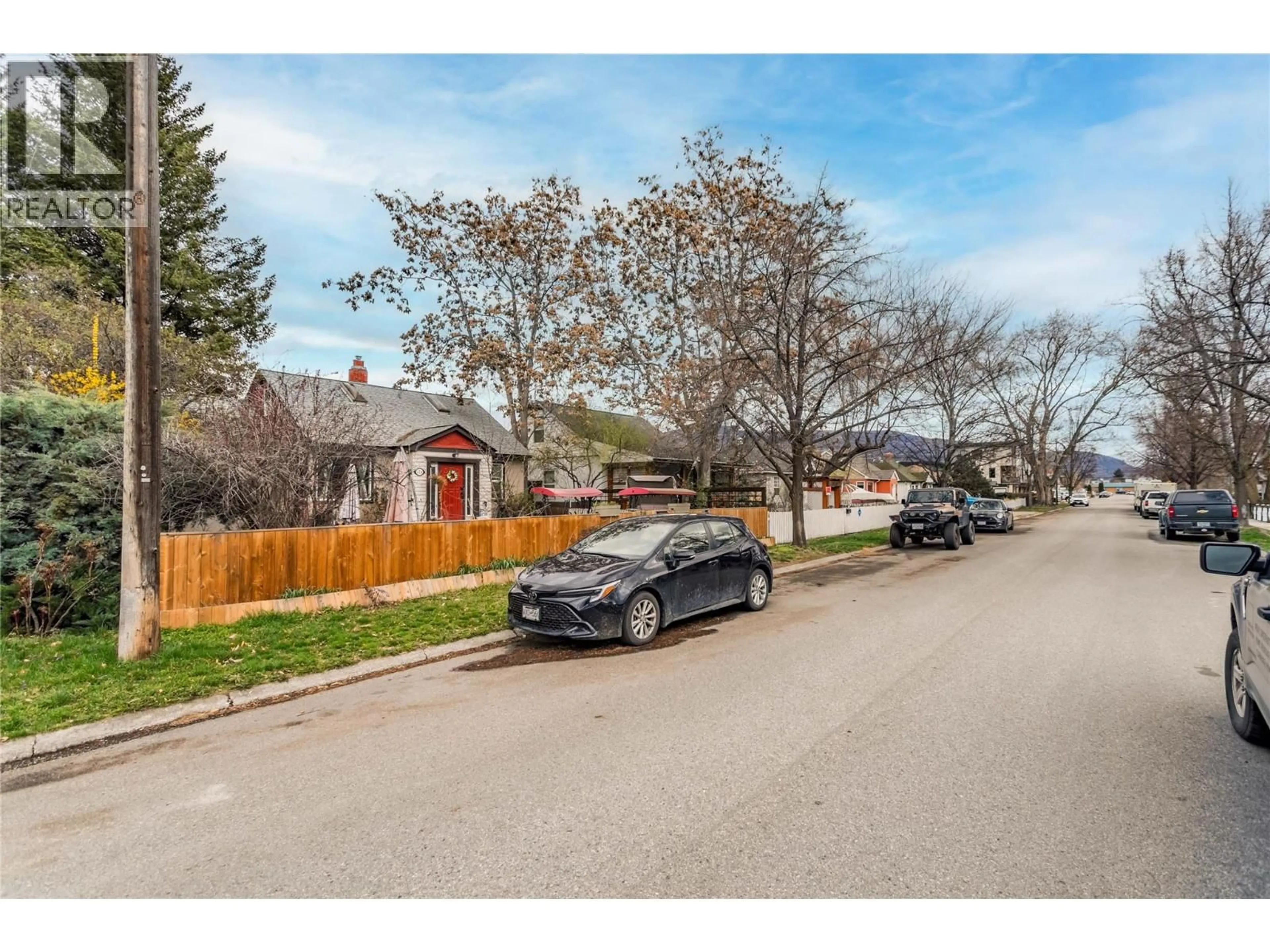 A pic from outside/outdoor area/front of a property/back of a property/a pic from drone, street for 126 BASSETT STREET, Penticton British Columbia V2A5W2