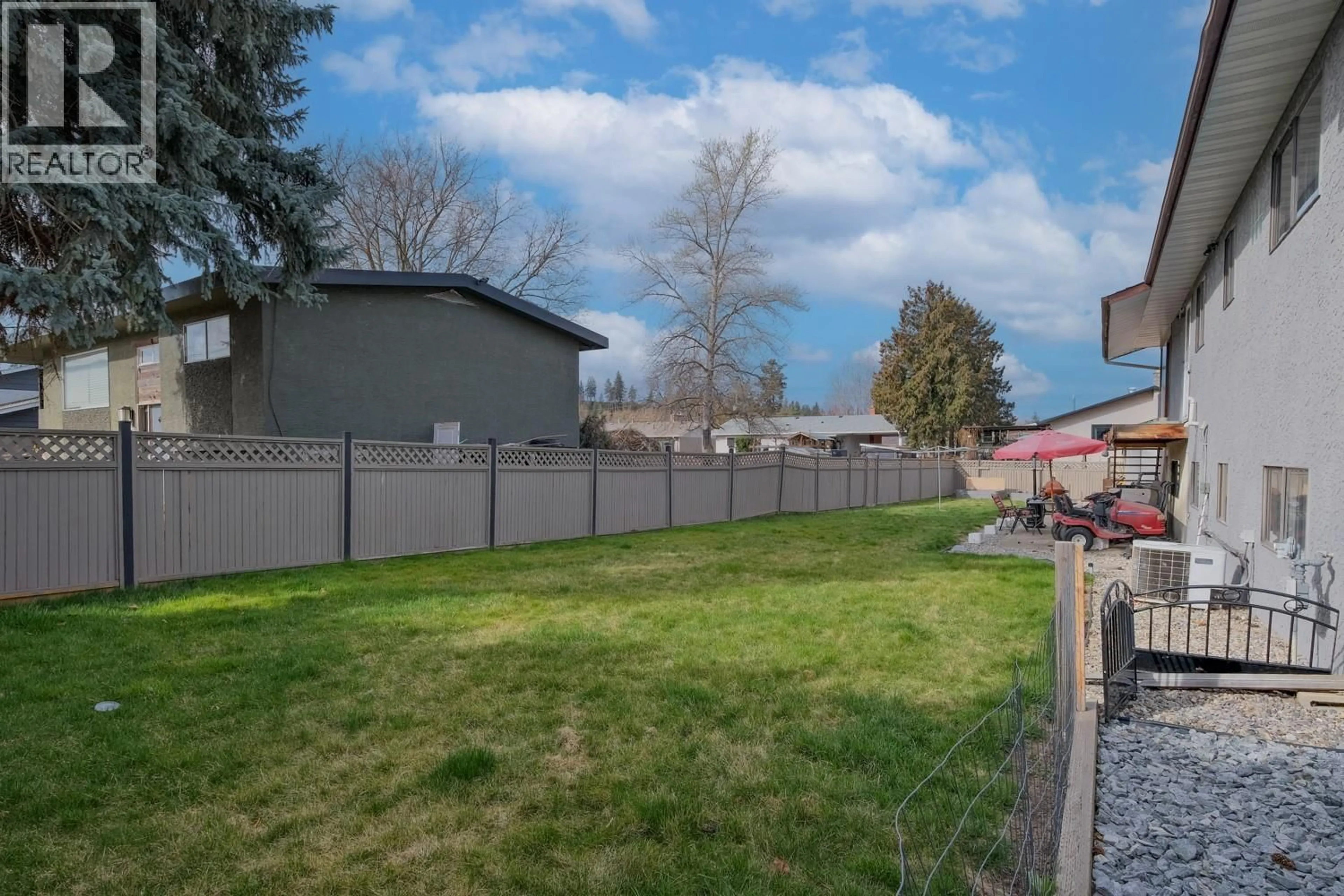 A pic from outside/outdoor area/front of a property/back of a property/a pic from drone, unknown for 1185 GRAHAM ROAD, Kelowna British Columbia V1X1J3