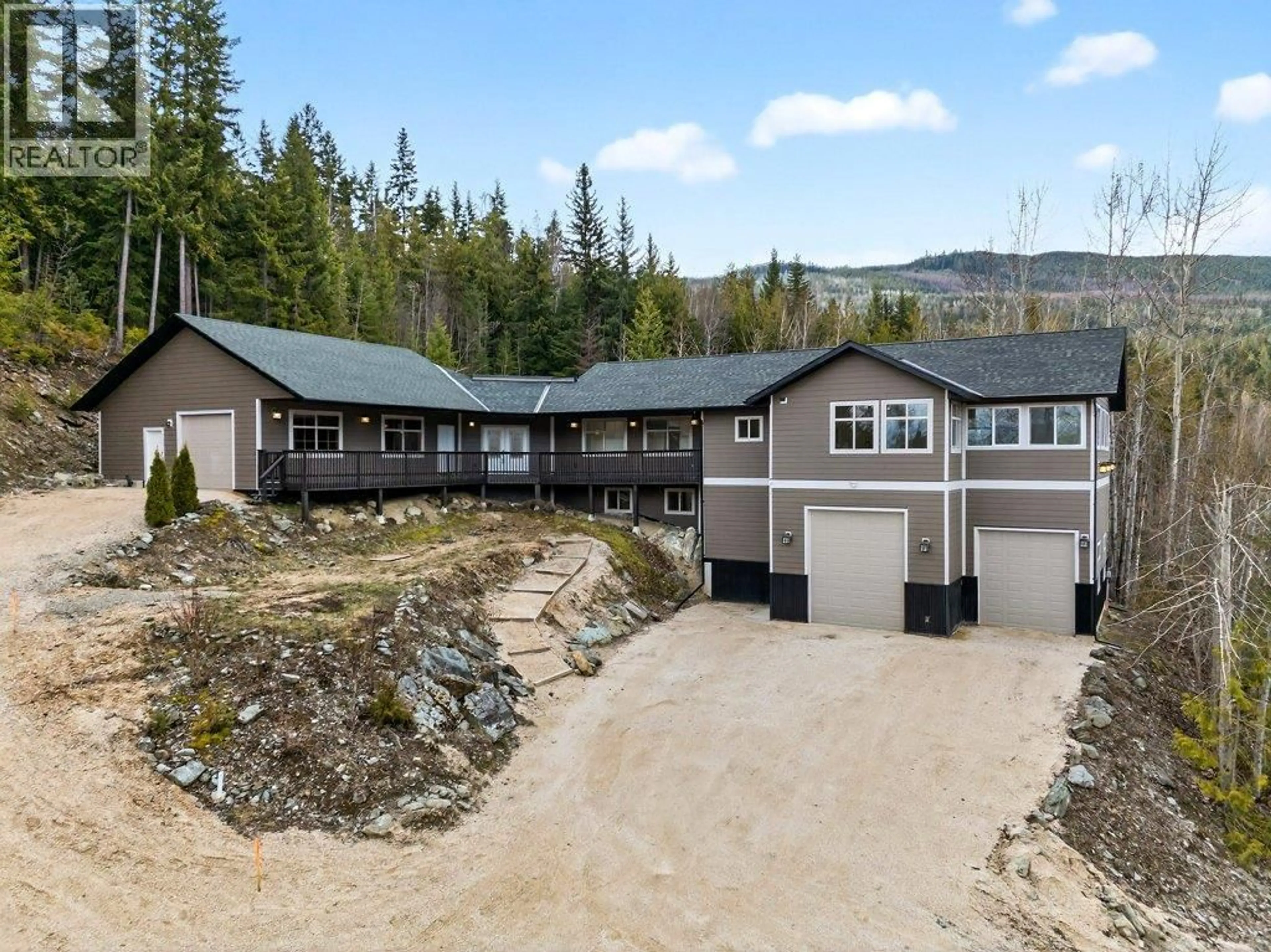 A pic from outside/outdoor area/front of a property/back of a property/a pic from drone, unknown for 5058 HERITAGE DRIVE, Eagle Bay British Columbia V0E1T0