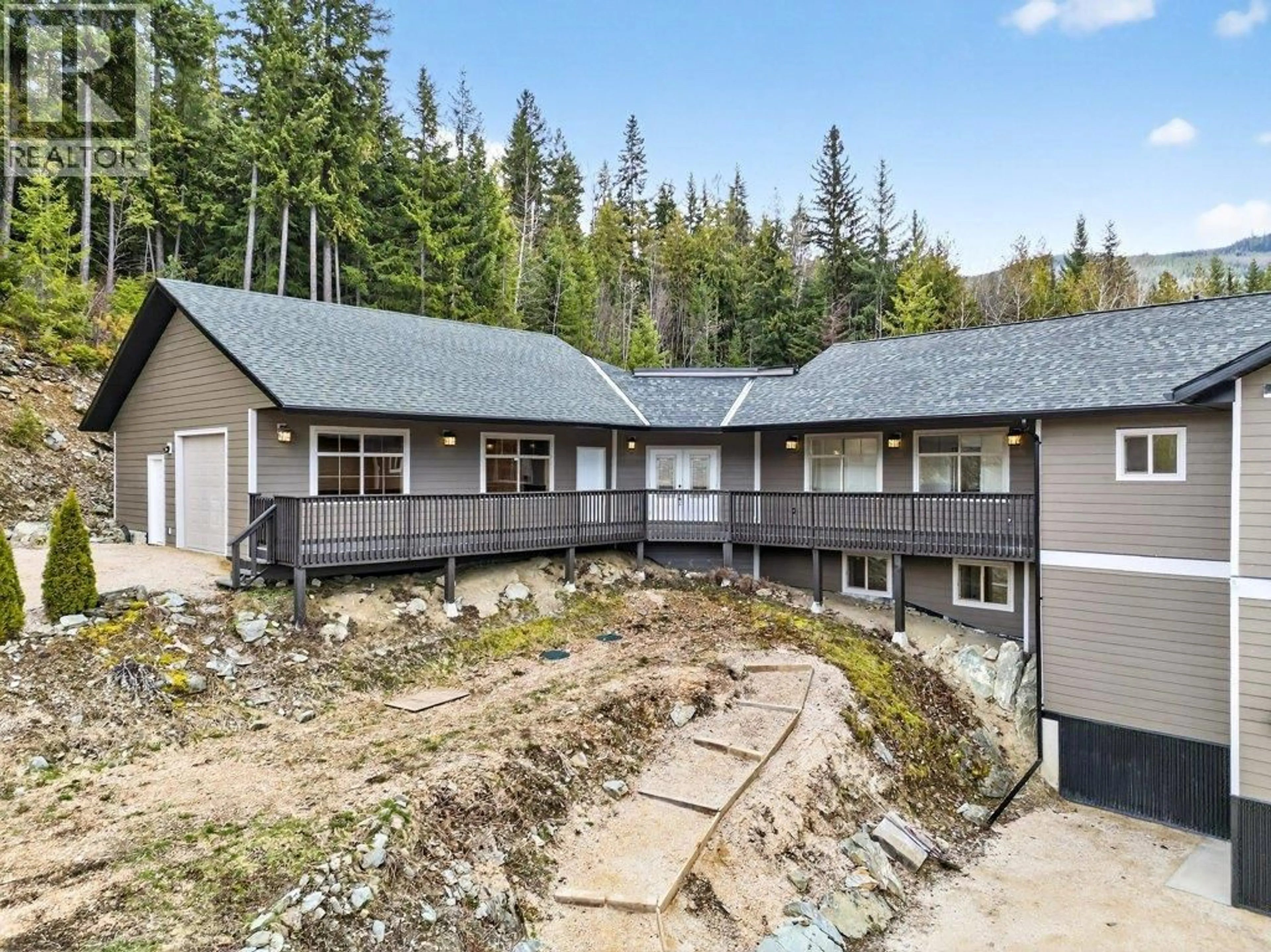 A pic from outside/outdoor area/front of a property/back of a property/a pic from drone, mountain view for 5058 HERITAGE DRIVE, Eagle Bay British Columbia V0E1T0